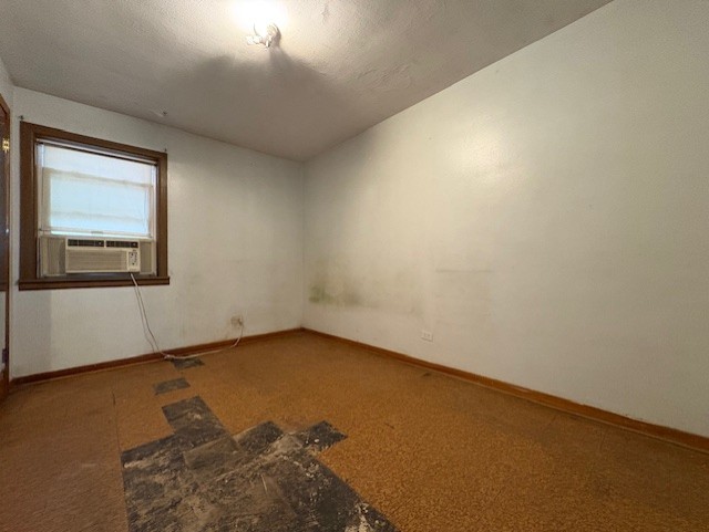7715 South Kilpatrick Avenue Chicago, IL 60652 - Photo 8 of 12 an empty room with a window