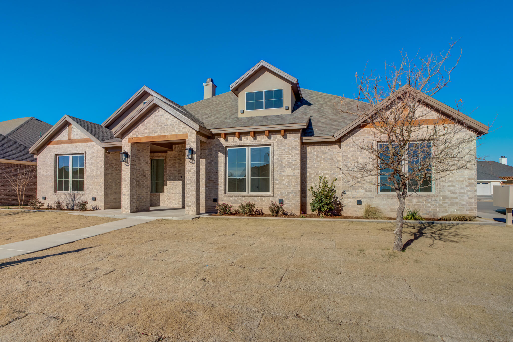 4602 140th Street Lubbock, TX 79424 - Photo 2 of 56 front view of a house with a yard
