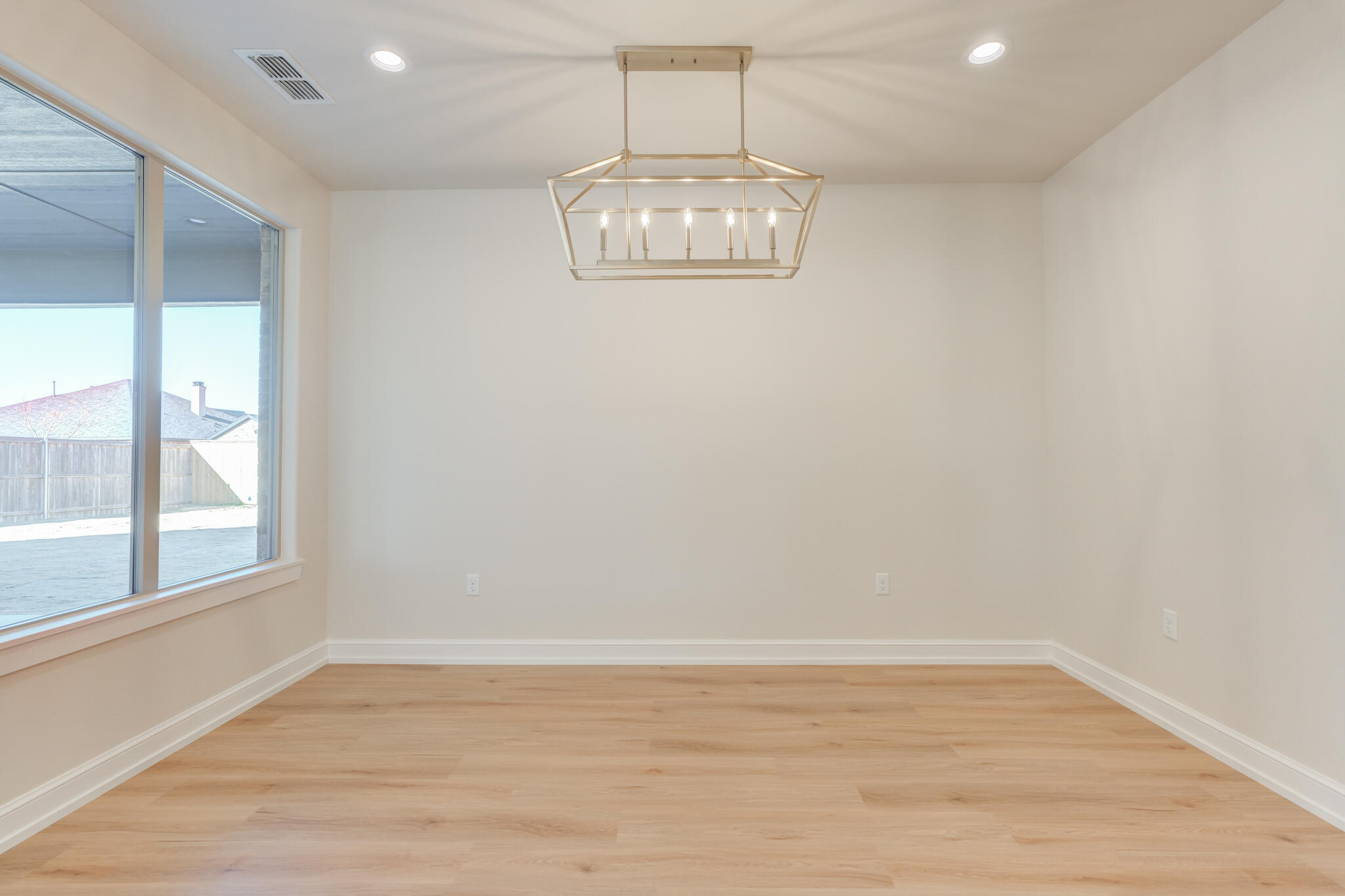 4602 140th Street Lubbock, TX 79424 - Photo 27 of 56 a view of an empty room with a window