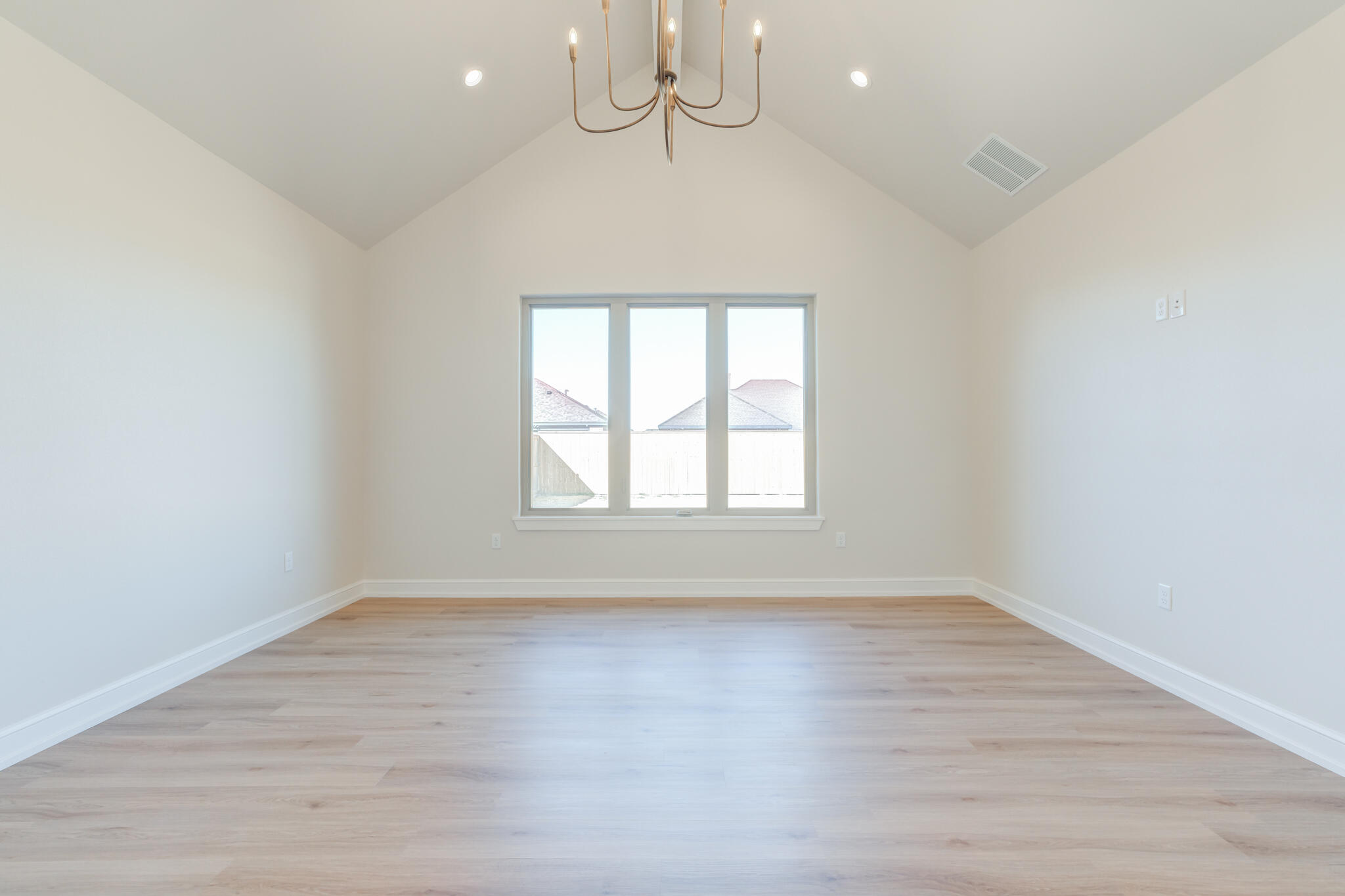 4602 140th Street Lubbock, TX 79424 - Photo 30 of 56 wooden floor in an empty room with a window