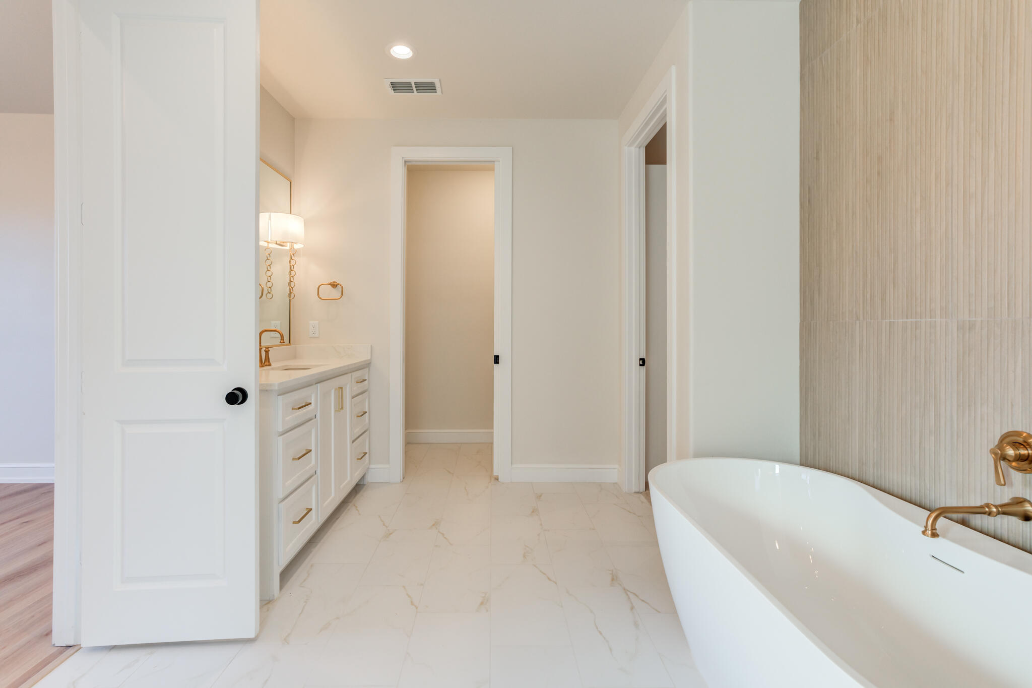 4602 140th Street Lubbock, TX 79424 - Photo 35 of 56 a bathroom with a bathtub and a sink