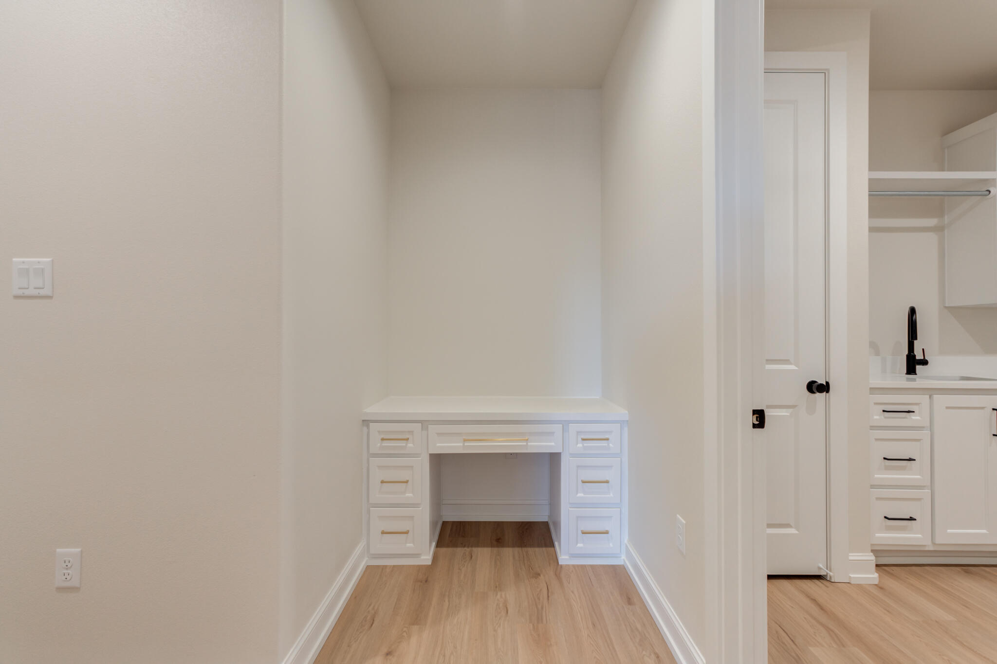 4602 140th Street Lubbock, TX 79424 - Photo 43 of 56 a view of an empty room with wooden floor