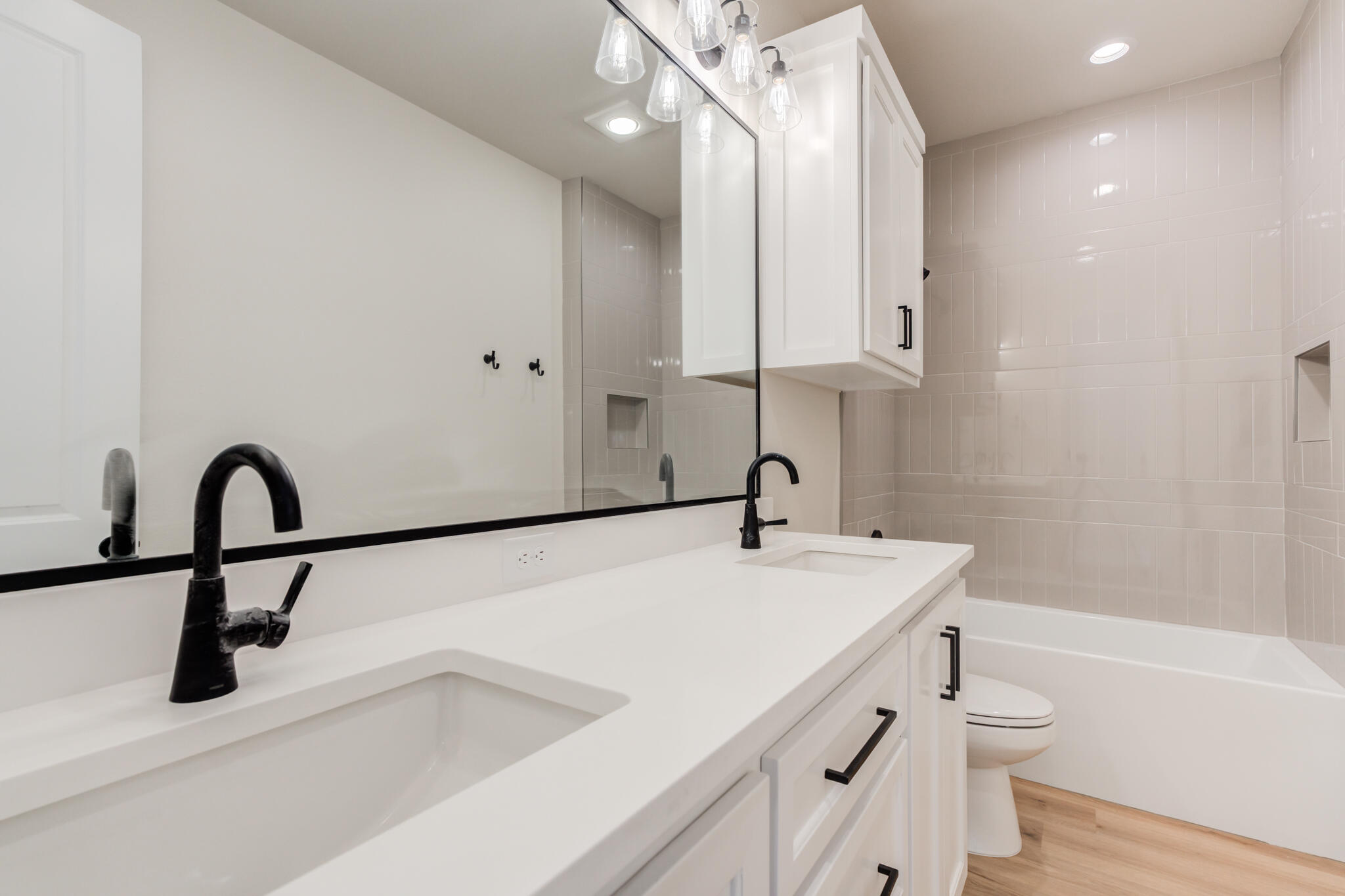 4602 140th Street Lubbock, TX 79424 - Photo 48 of 56 a bathroom with a sink a toilet and a tub