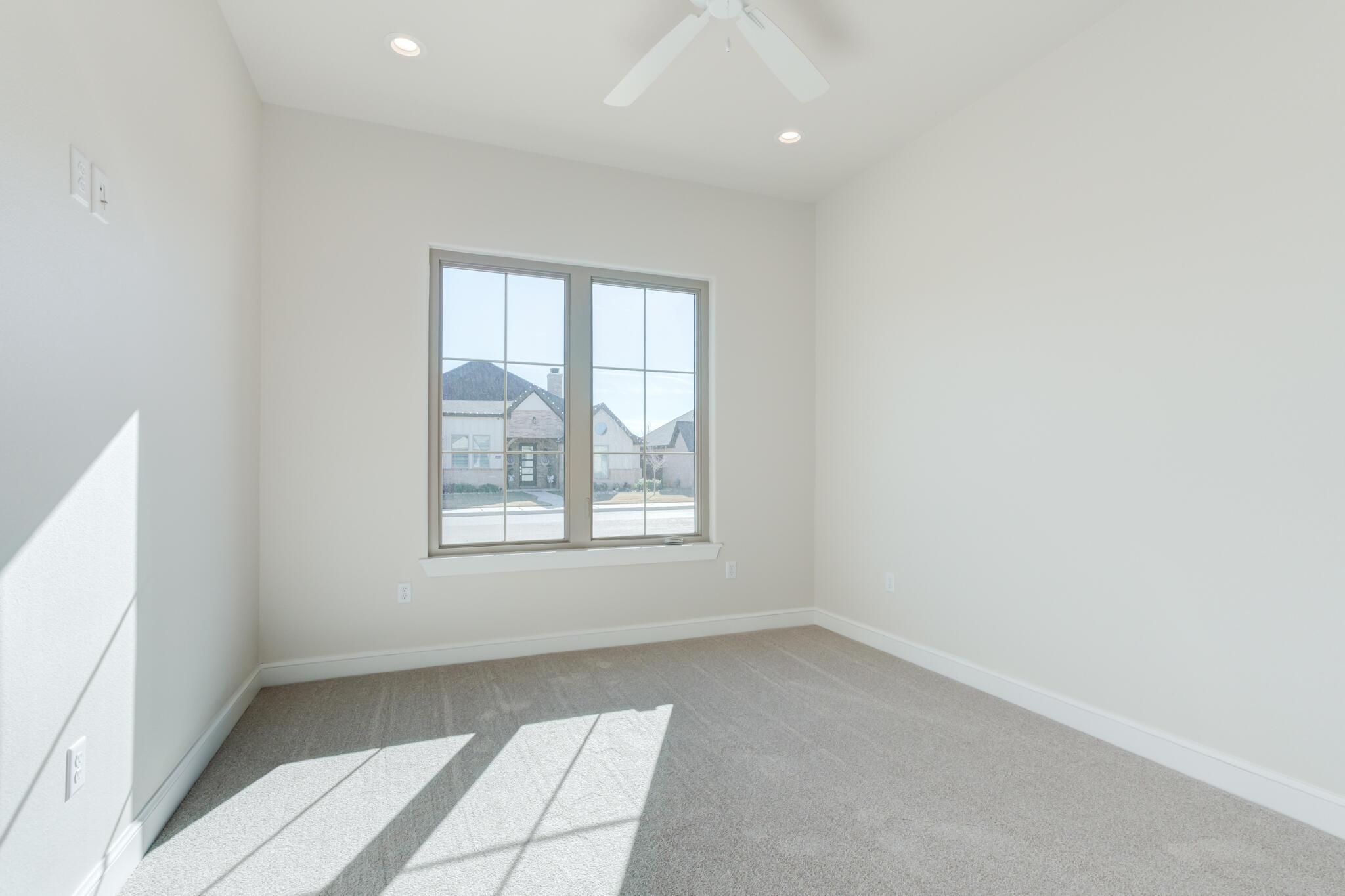 4602 140th Street Lubbock, TX 79424 - Photo 49 of 56 an empty room with windows