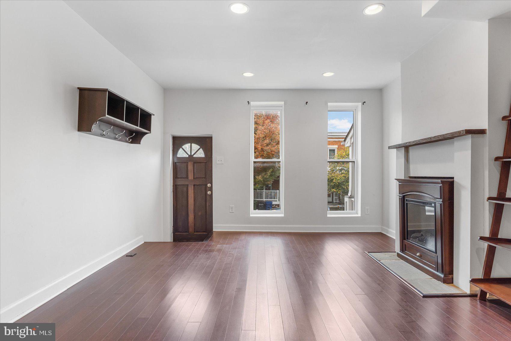 3112 Keswick Road Baltimore, MD 21211 - Photo 13 of 48 wall-mounted shelf and coat-rack included