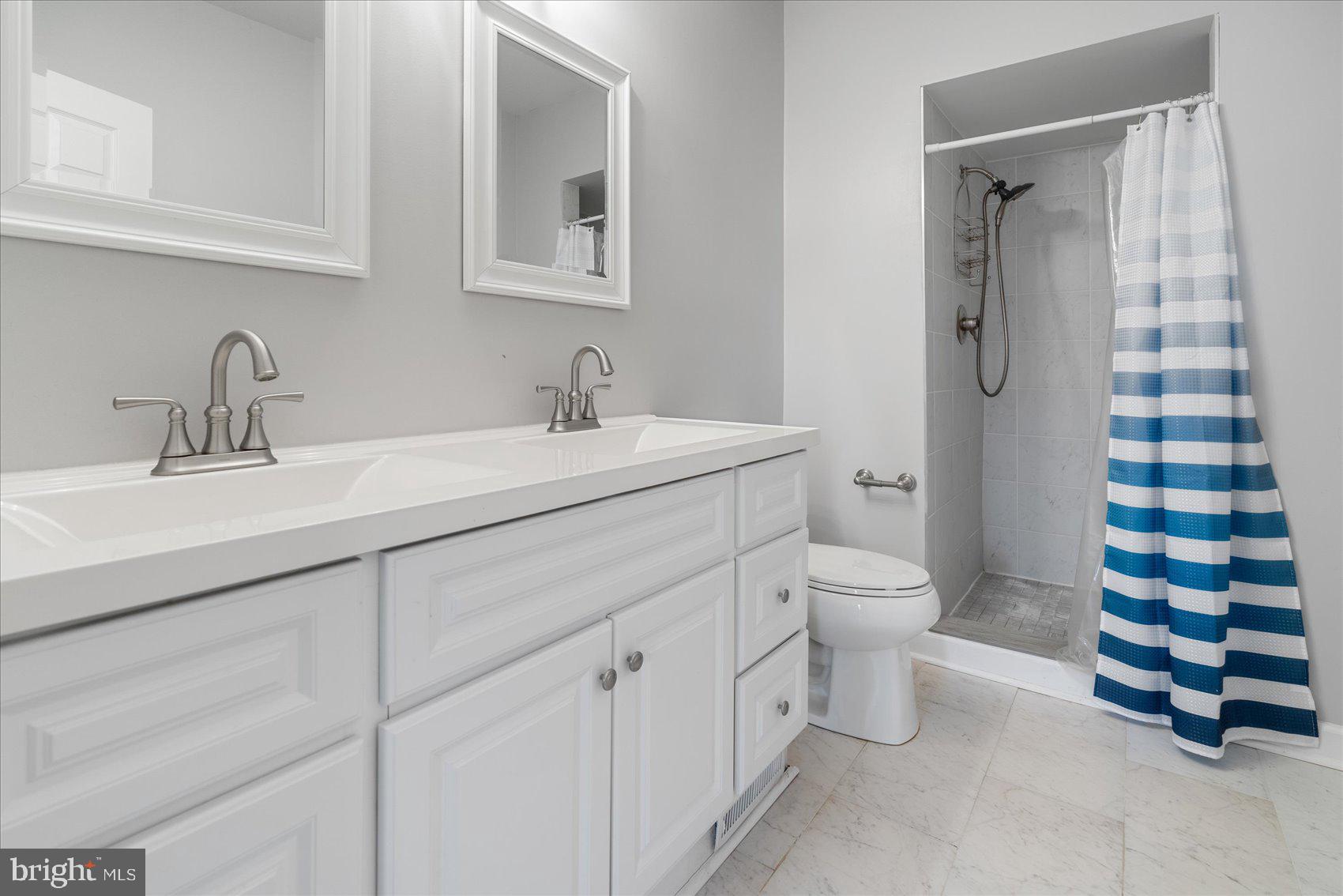 3112 Keswick Road Baltimore, MD 21211 - Photo 38 of 48 Master bathroom with double vanity