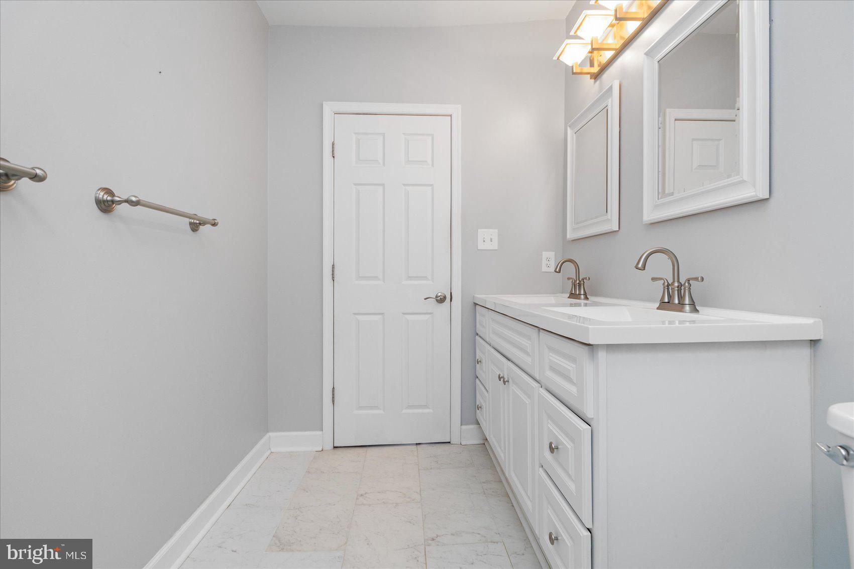 3112 Keswick Road Baltimore, MD 21211 - Photo 40 of 48 Master bathroom with double vanity