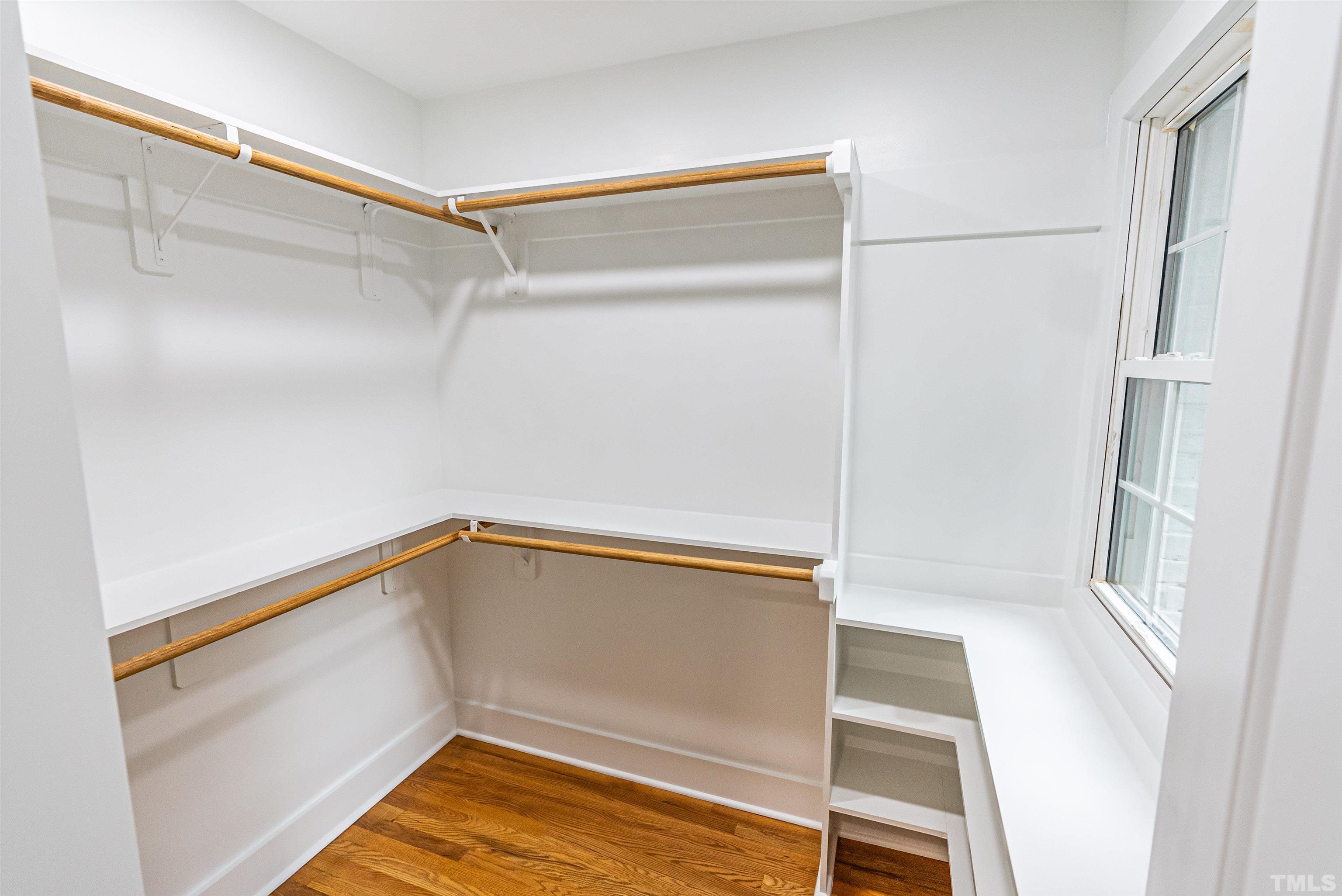 5405 Emerson Drive Raleigh, NC 27609 - Photo 20 of 46 a view of walk in closet with empty racks