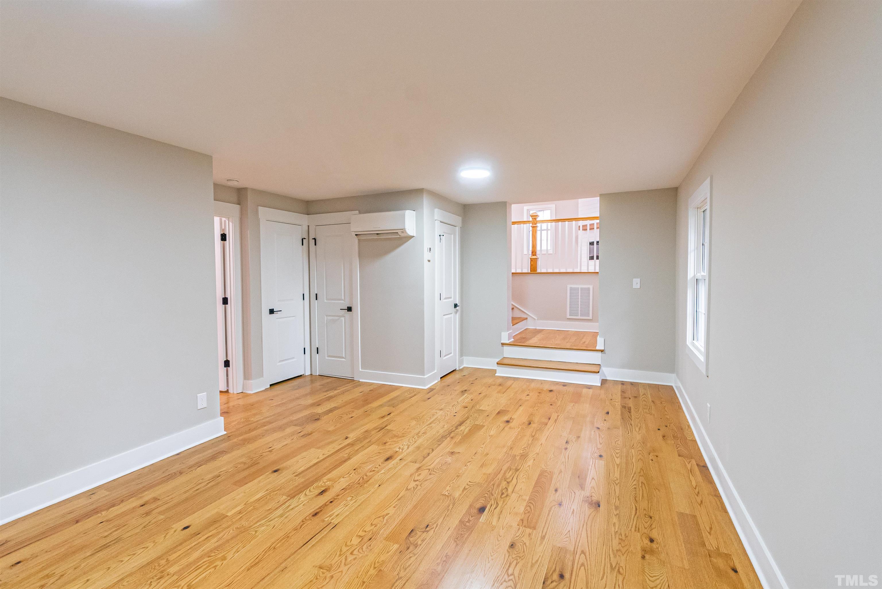 5405 Emerson Drive Raleigh, NC 27609 - Photo 26 of 46 a view of empty room with wooden floor