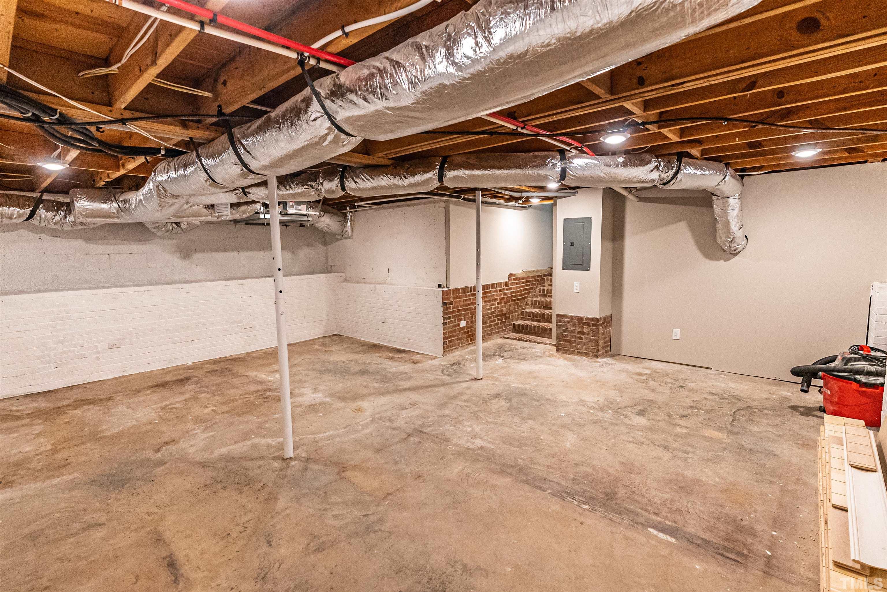 5405 Emerson Drive Raleigh, NC 27609 - Photo 35 of 46 a view of empty room with windows