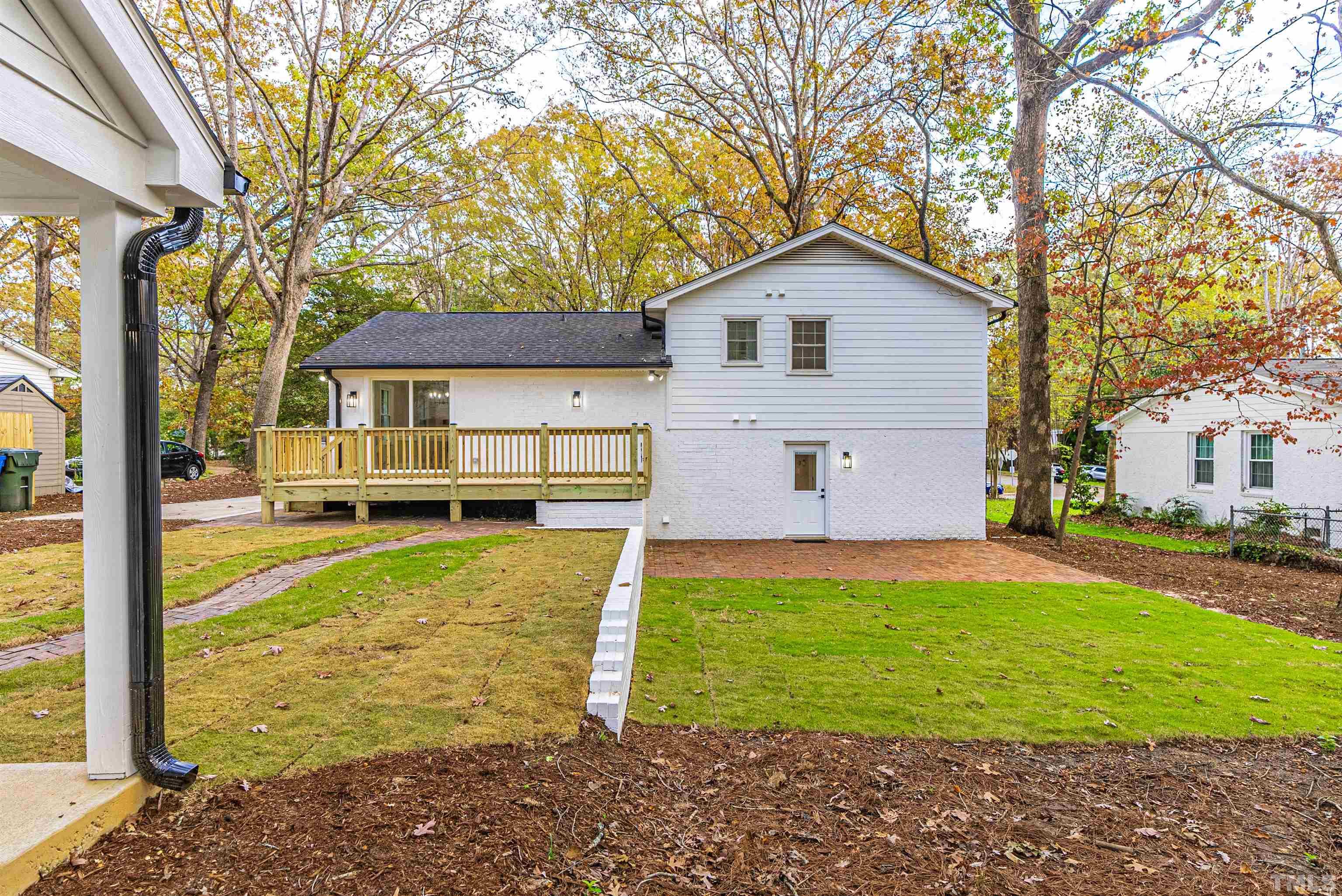 5405 Emerson Drive Raleigh, NC 27609 - Photo 42 of 46 a view of a house with a yard and large tree