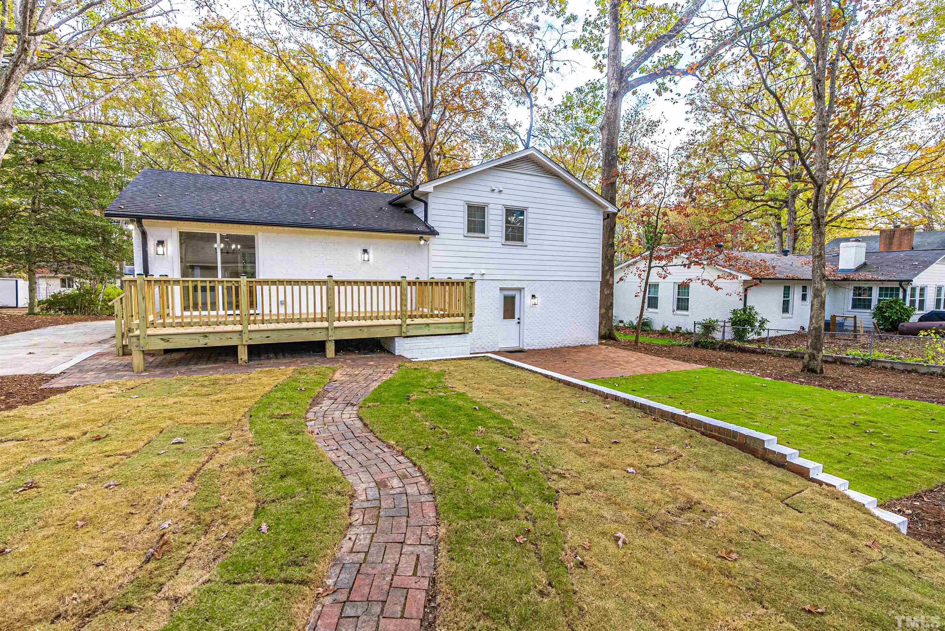 5405 Emerson Drive Raleigh, NC 27609 - Photo 43 of 46 a view of a house with a yard