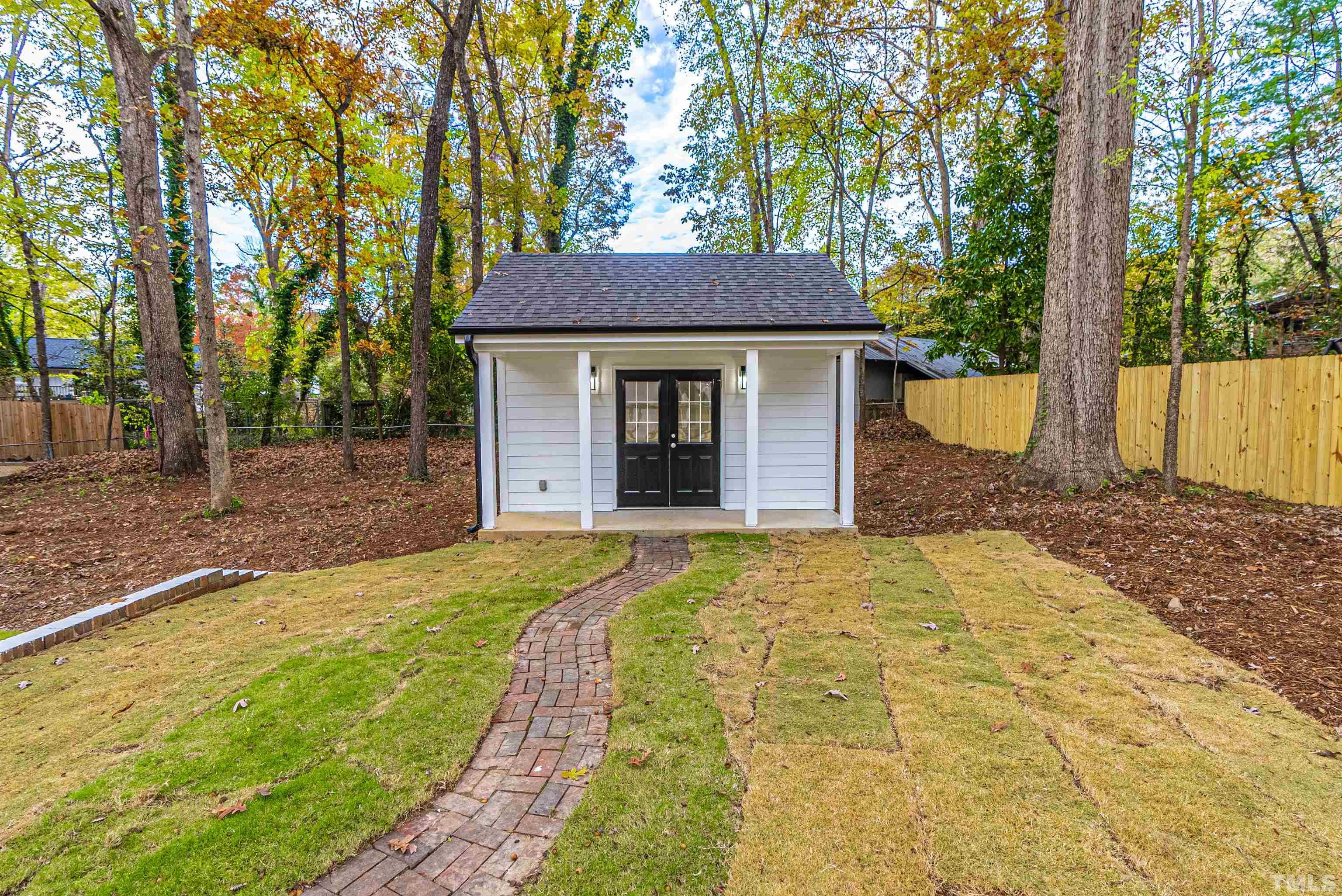 5405 Emerson Drive Raleigh, NC 27609 - Photo 44 of 46 a front view of a house with a yard