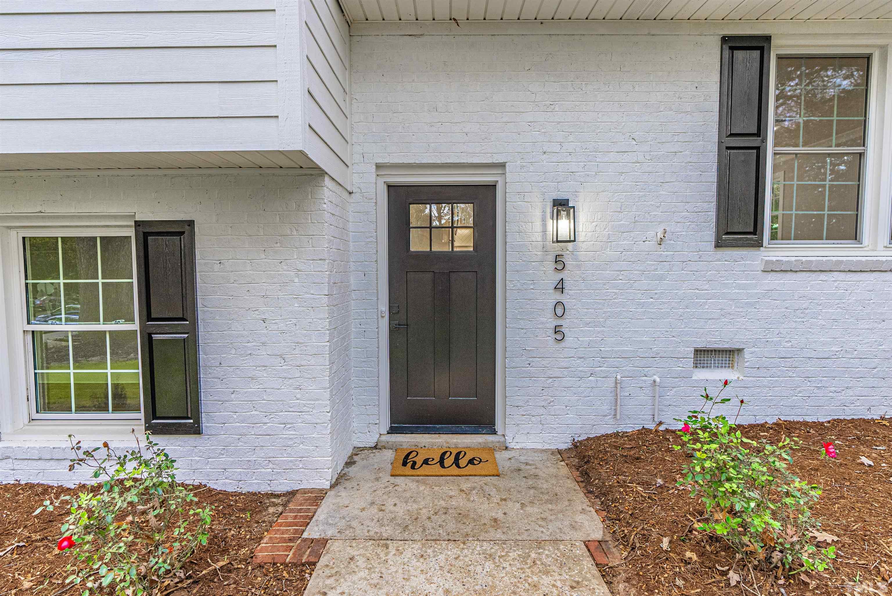 5405 Emerson Drive Raleigh, NC 27609 - Photo 5 of 46 a front view of a house
