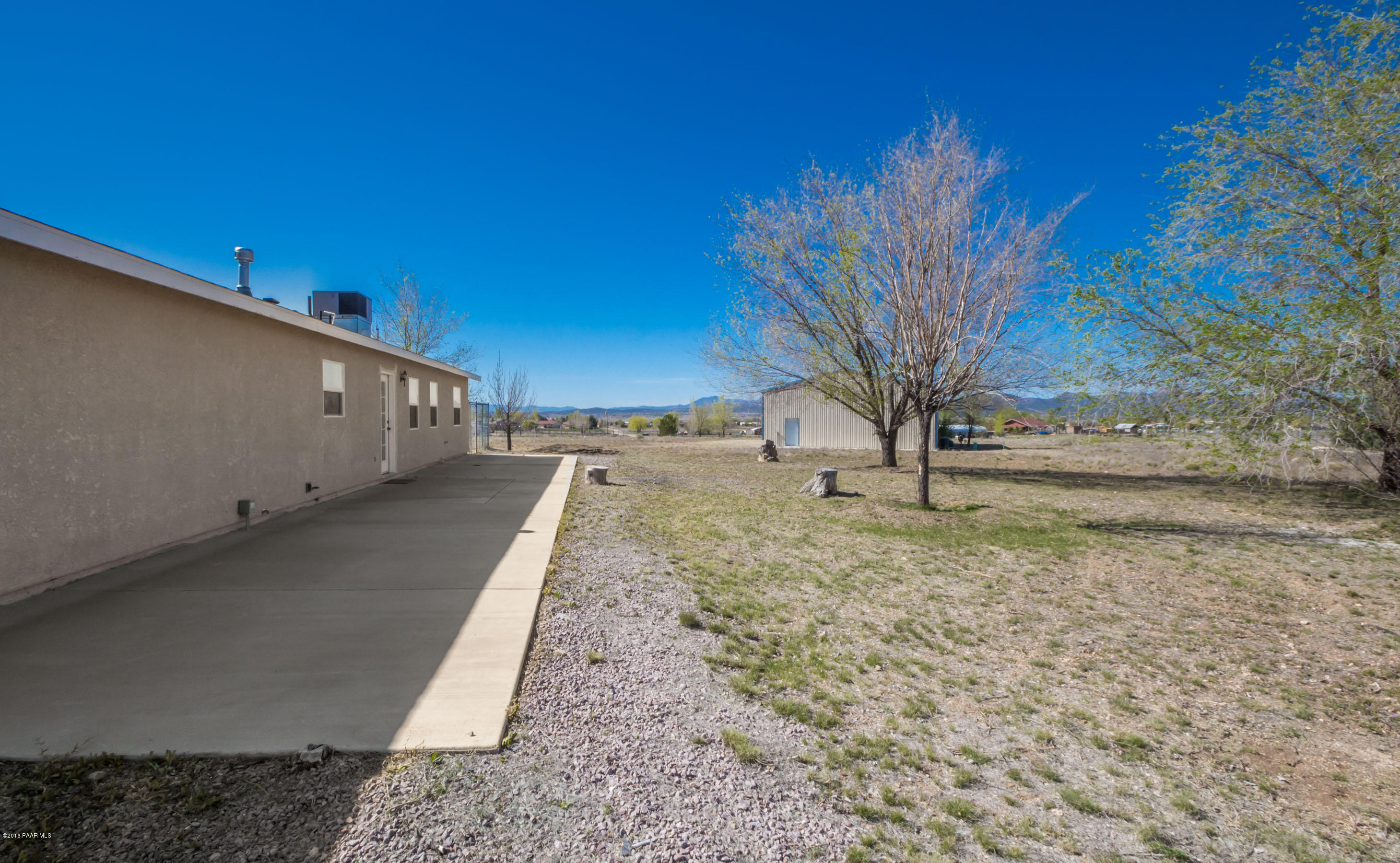 25800 Poppy Road Paulden, AZ 86334 - Photo 14 of 15 a view of a backyard of the house