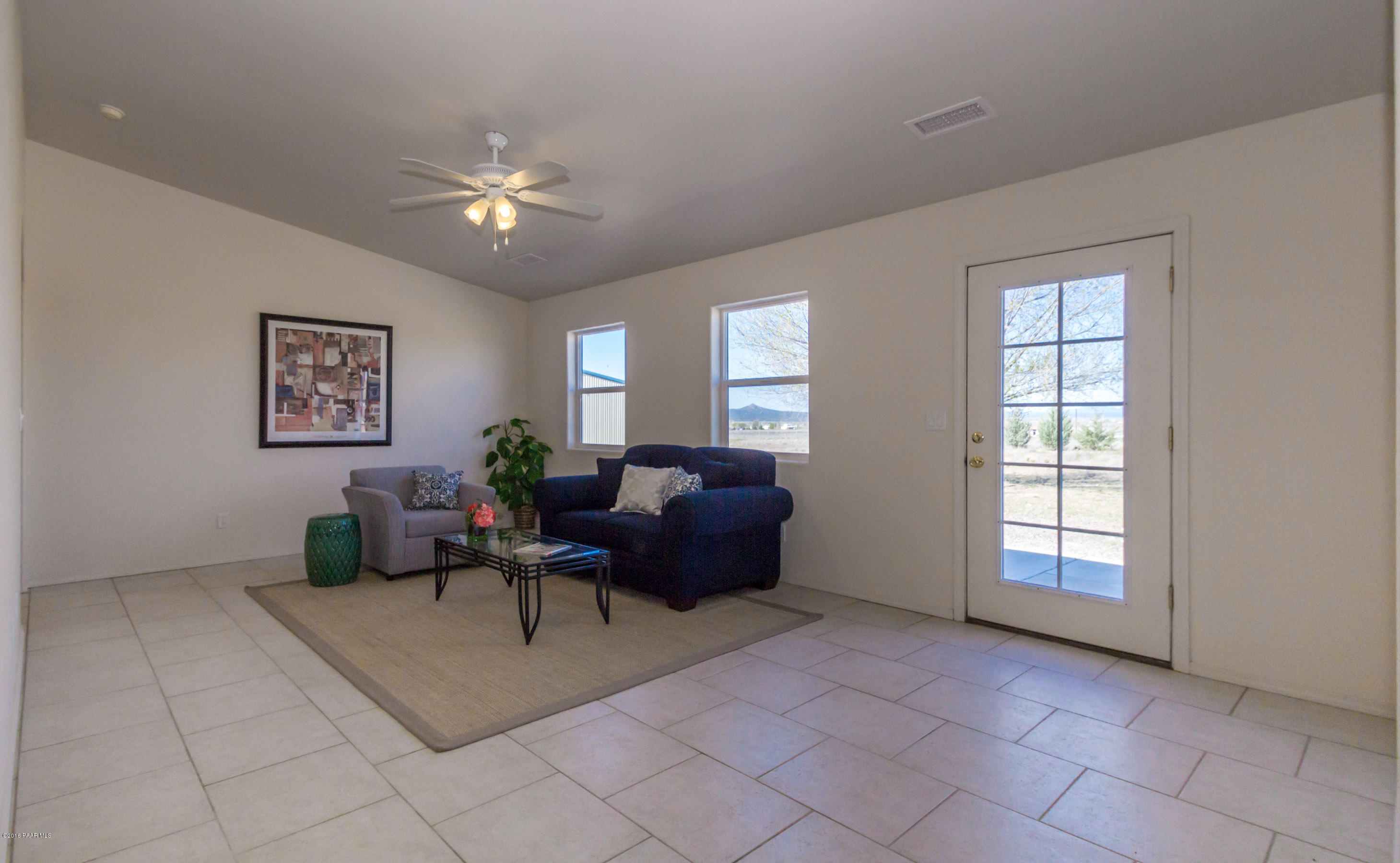 25800 Poppy Road Paulden, AZ 86334 - Photo 2 of 15 a living room with furniture and white walls