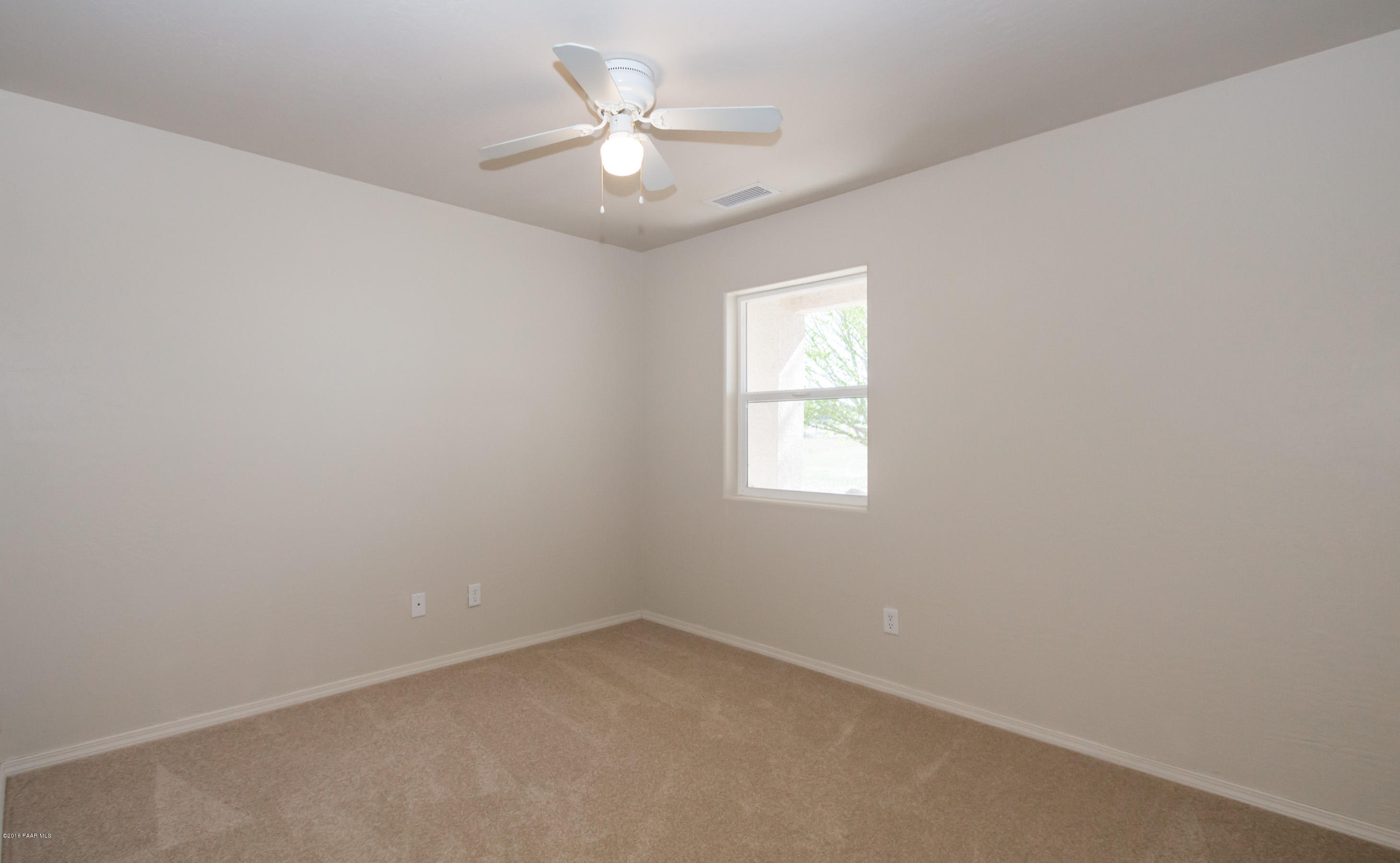 25800 Poppy Road Paulden, AZ 86334 - Photo 8 of 15 an empty room with a window