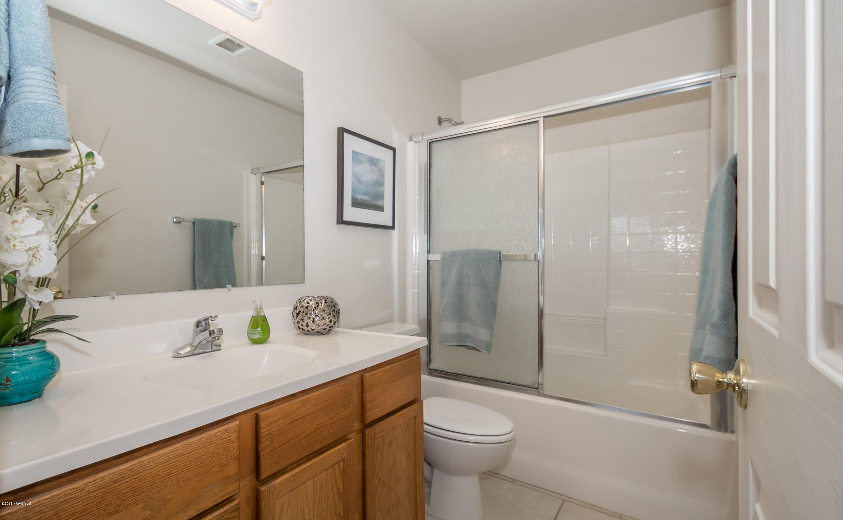 25800 Poppy Road Paulden, AZ 86334 - Photo 9 of 15 a bathroom with a sink a toilet and shower