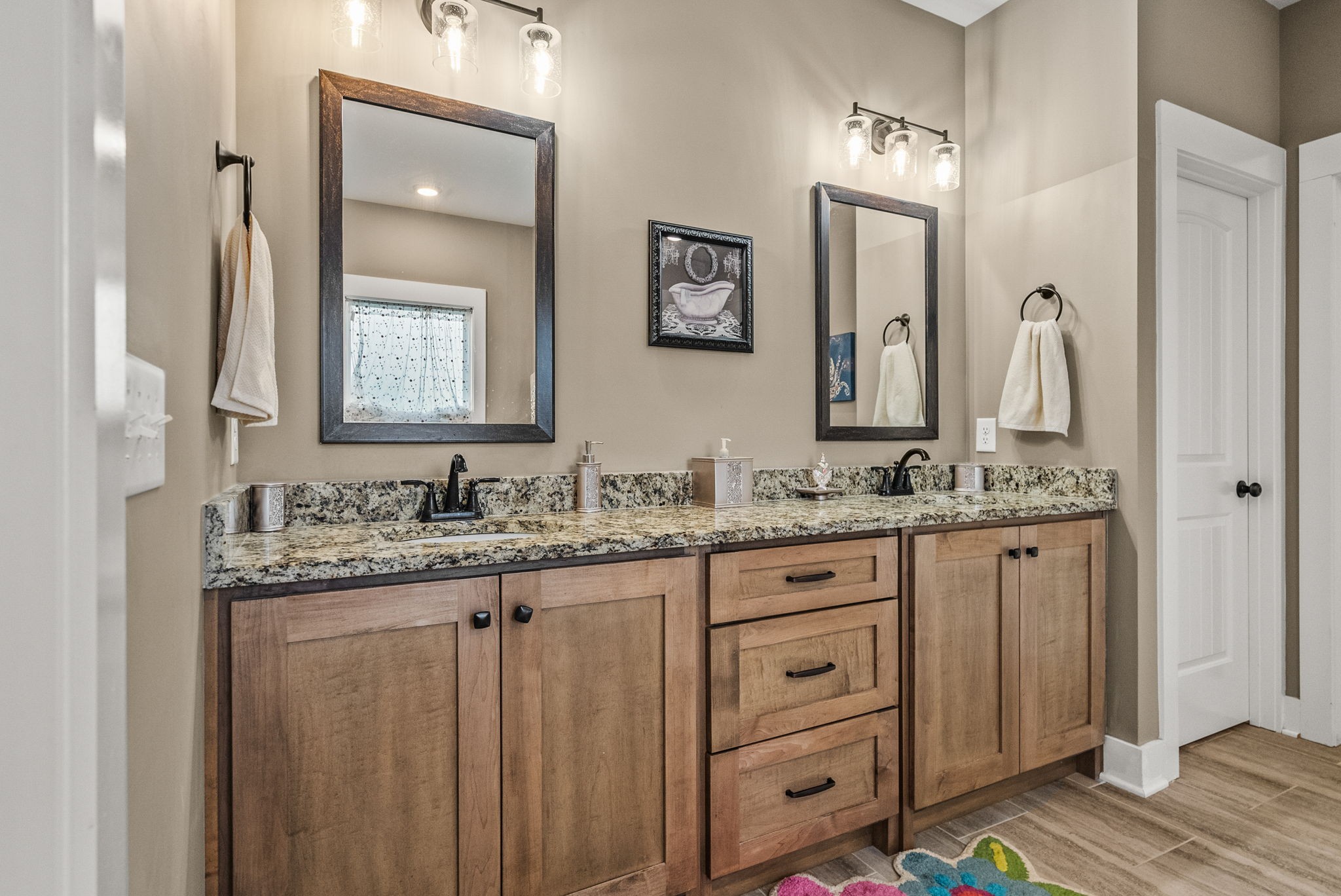3378 New Hall Road Greenbrier, TN 37073 - Photo 42 of 83 a bathroom with a granite countertop sink vanity and mirror