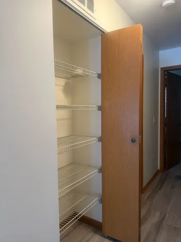 a bathroom with a sink a toilet and vanity