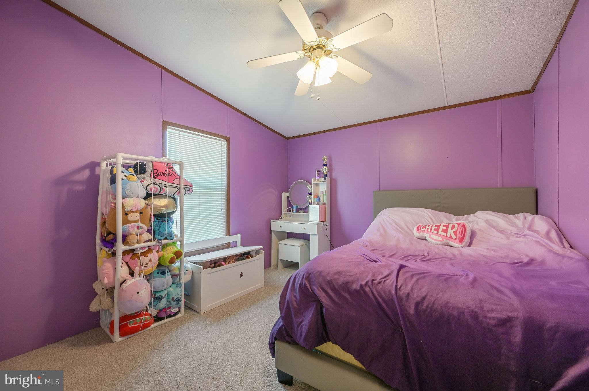 33 Hedgerow Hollow Road, Unit 33 Smyrna, DE 19977 - Photo 15 of 20 a bedroom with a bed and a desk