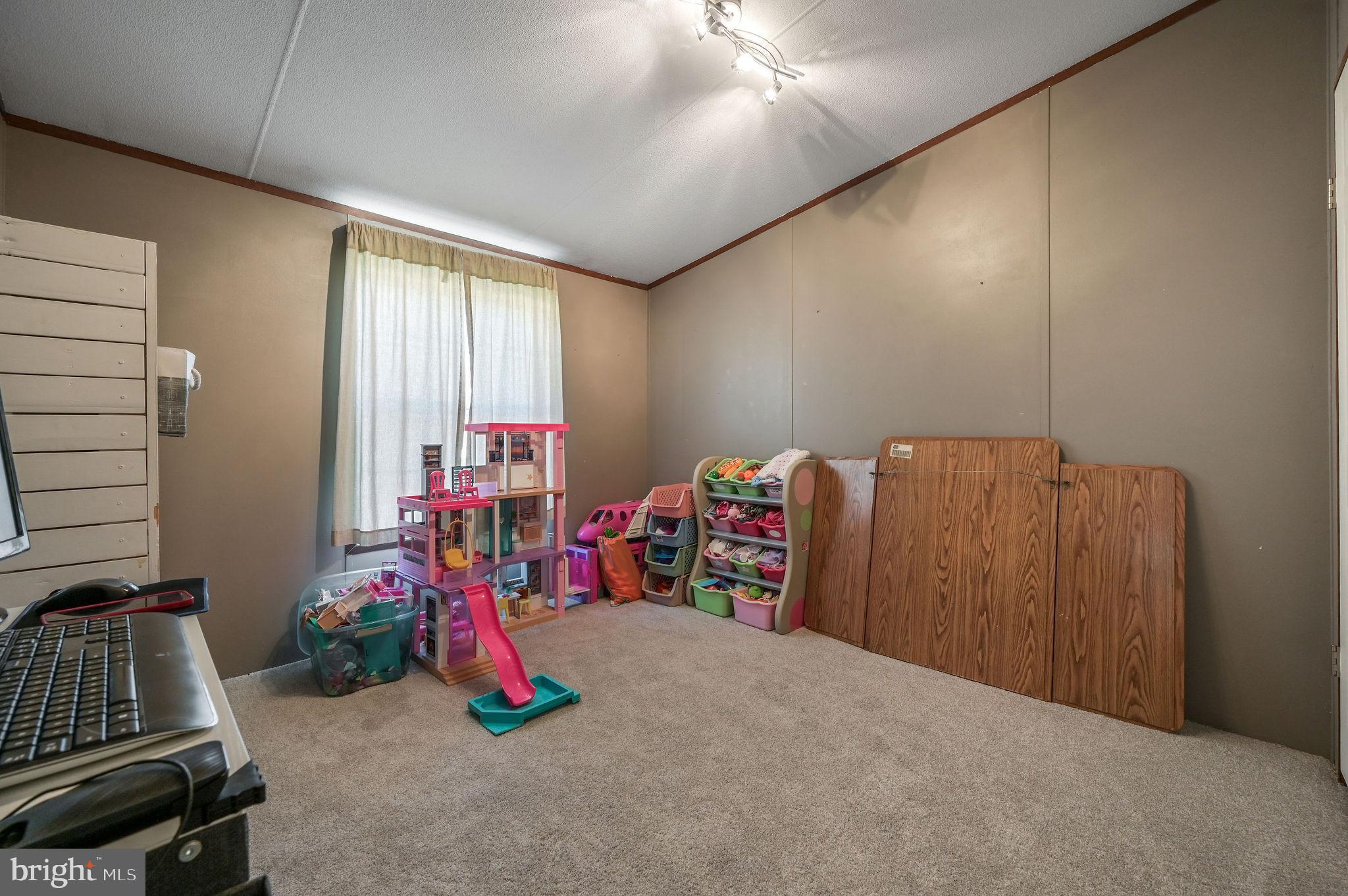 33 Hedgerow Hollow Road, Unit 33 Smyrna, DE 19977 - Photo 17 of 20 a view of a room with gym equipment