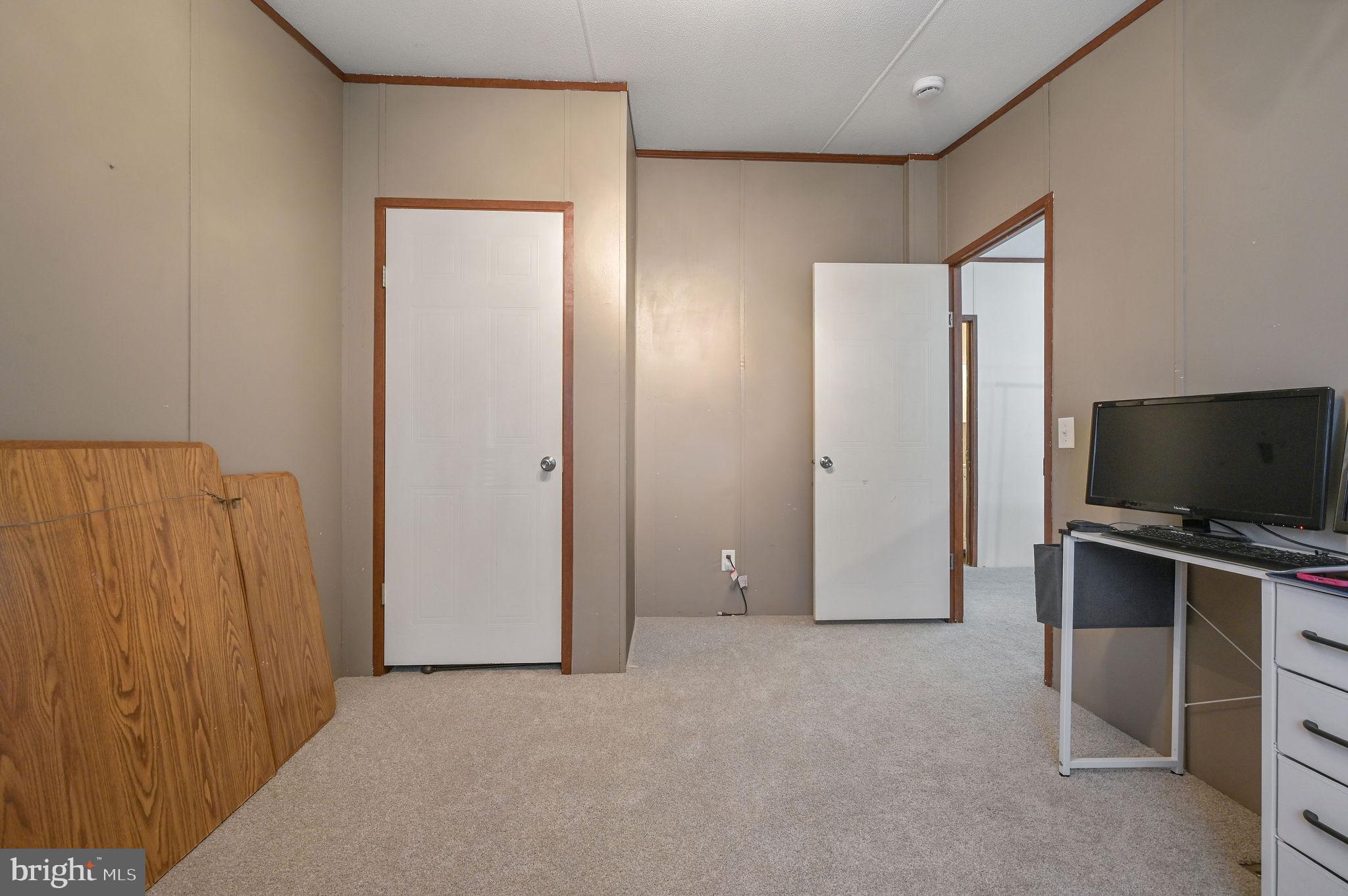 33 Hedgerow Hollow Road, Unit 33 Smyrna, DE 19977 - Photo 18 of 20 an empty room with closet area
