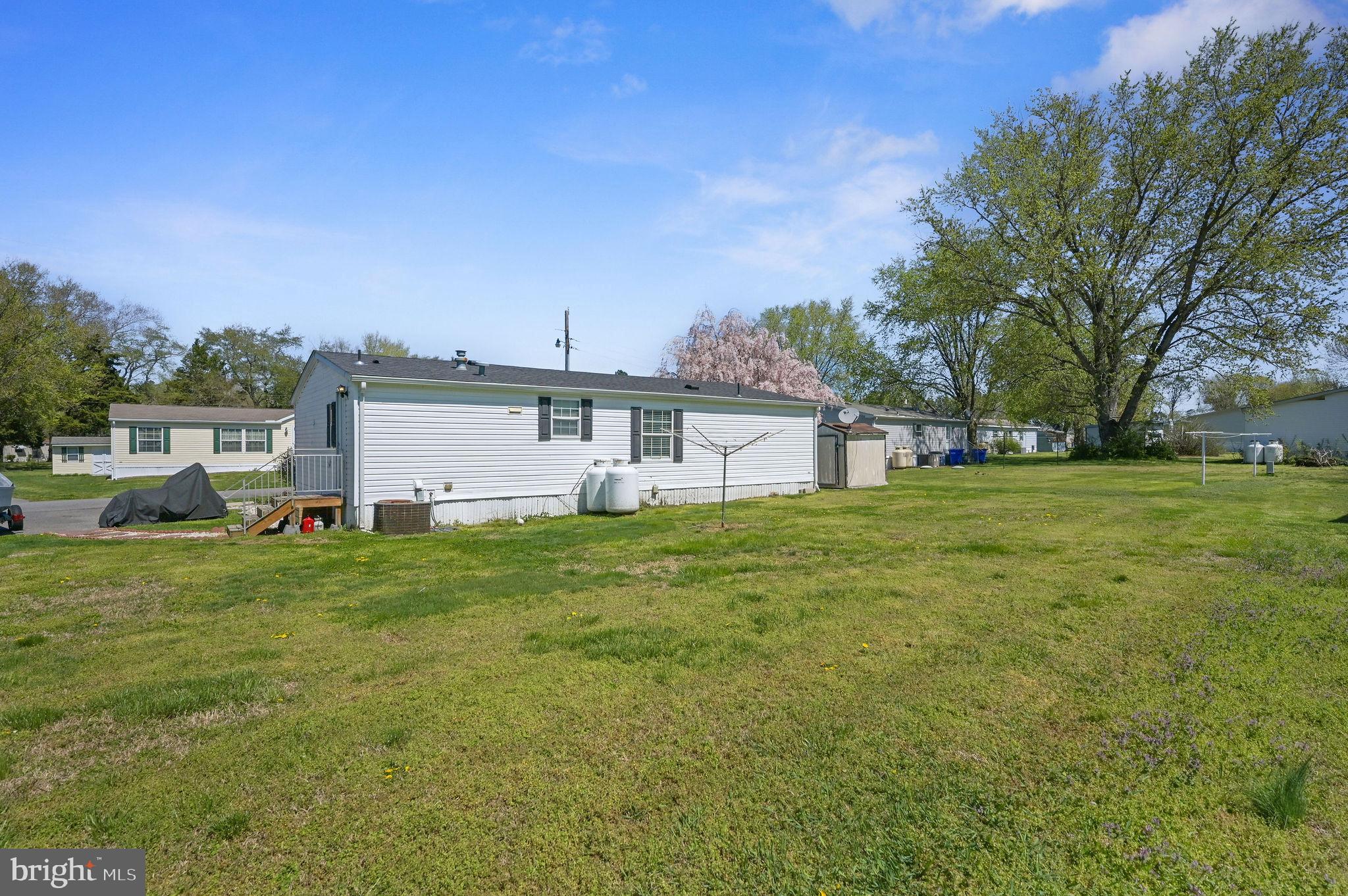 33 Hedgerow Hollow Road, Unit 33 Smyrna, DE 19977 - Photo 20 of 20 a view of a house with backyard and garden