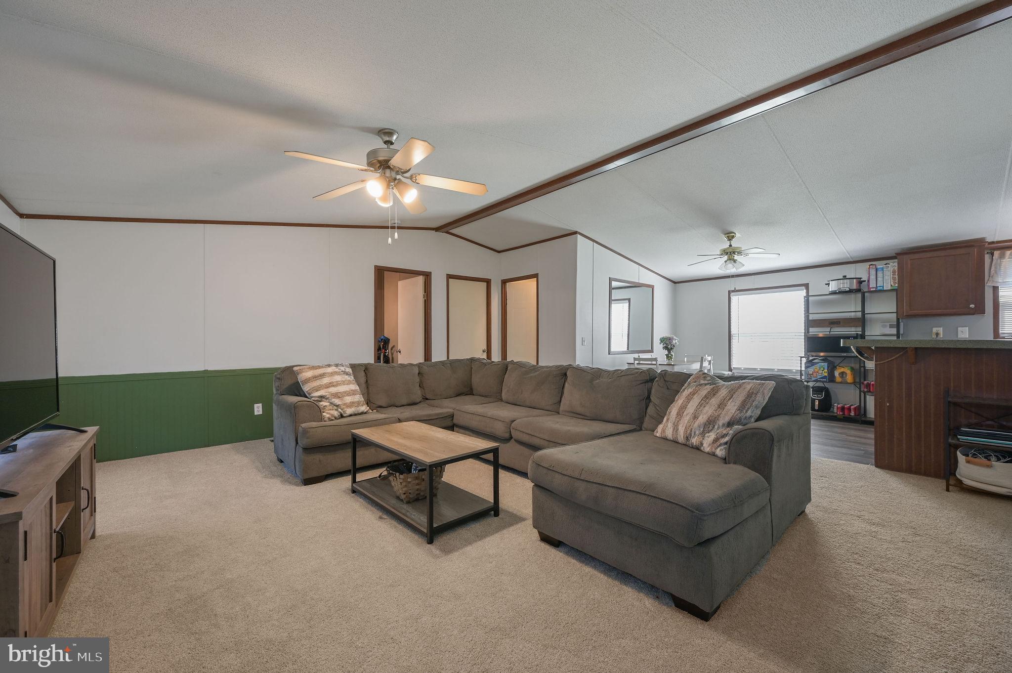 33 Hedgerow Hollow Road, Unit 33 Smyrna, DE 19977 - Photo 2 of 20 a living room with furniture and a fireplace