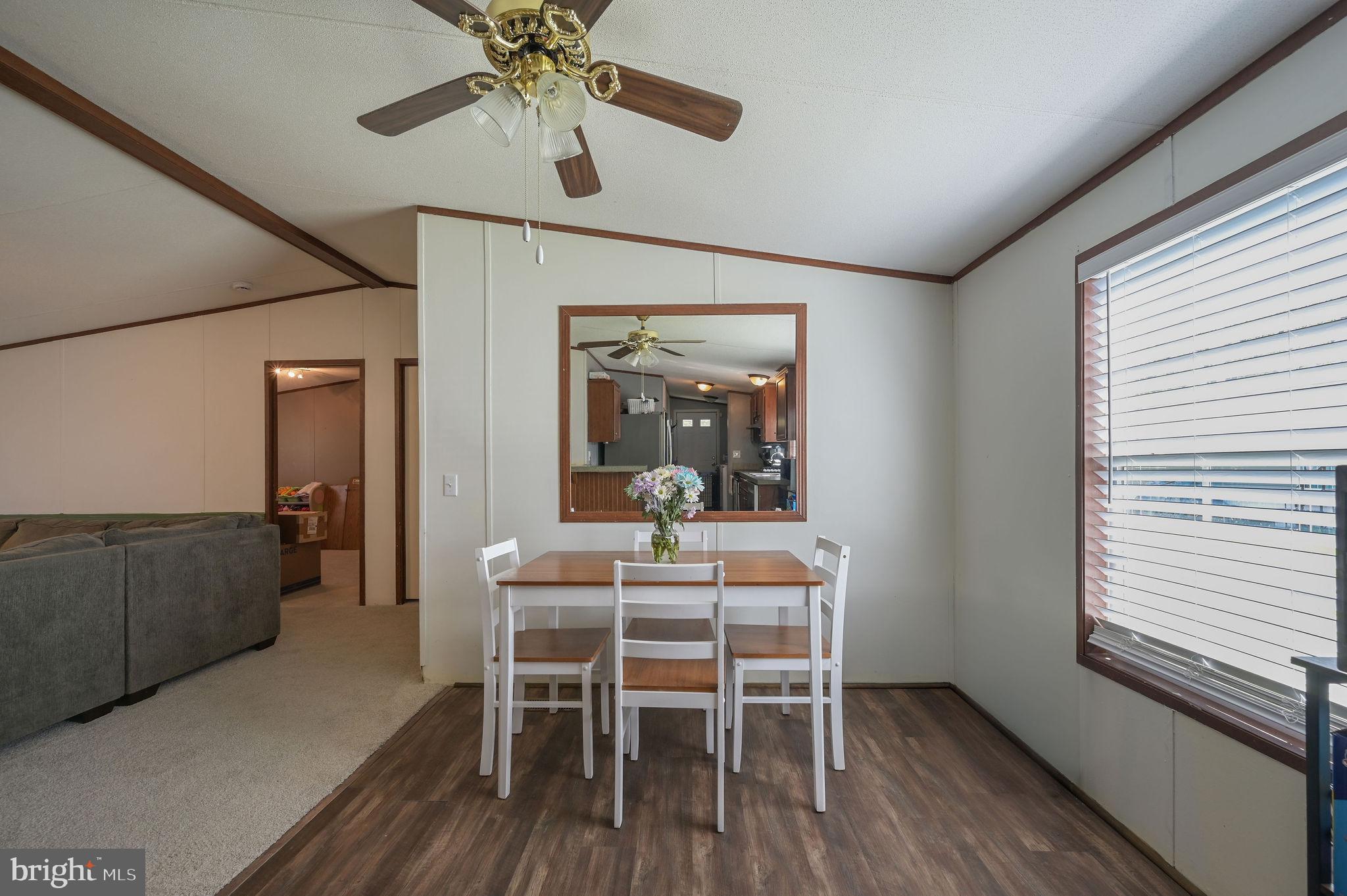 33 Hedgerow Hollow Road, Unit 33 Smyrna, DE 19977 - Photo 7 of 20 a dining room with furniture and window