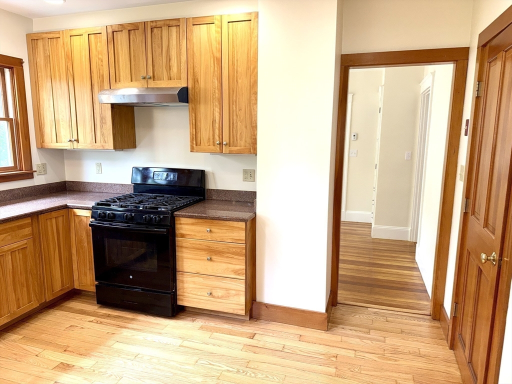 39 Newman Road Malden, MA 02148 - Photo 7 of 27 a kitchen with a sink and a window