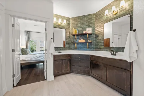 a view of a balcony with wooden floor