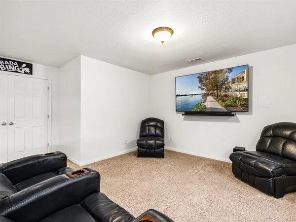 a living room with furniture and a couch
