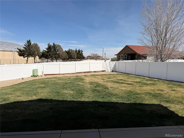 a view of a house with a big yard