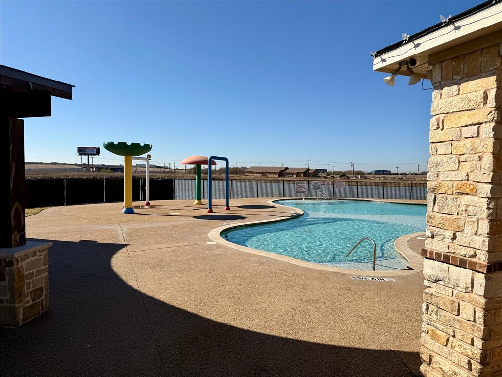 1117 Bent Tree Road Royse City, TX 75189 - Photo 17 of 22 Community pool featuring a patio area