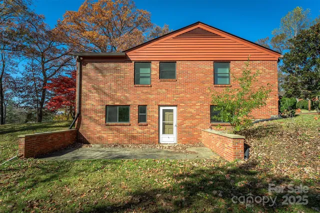 a front view of a house with yard