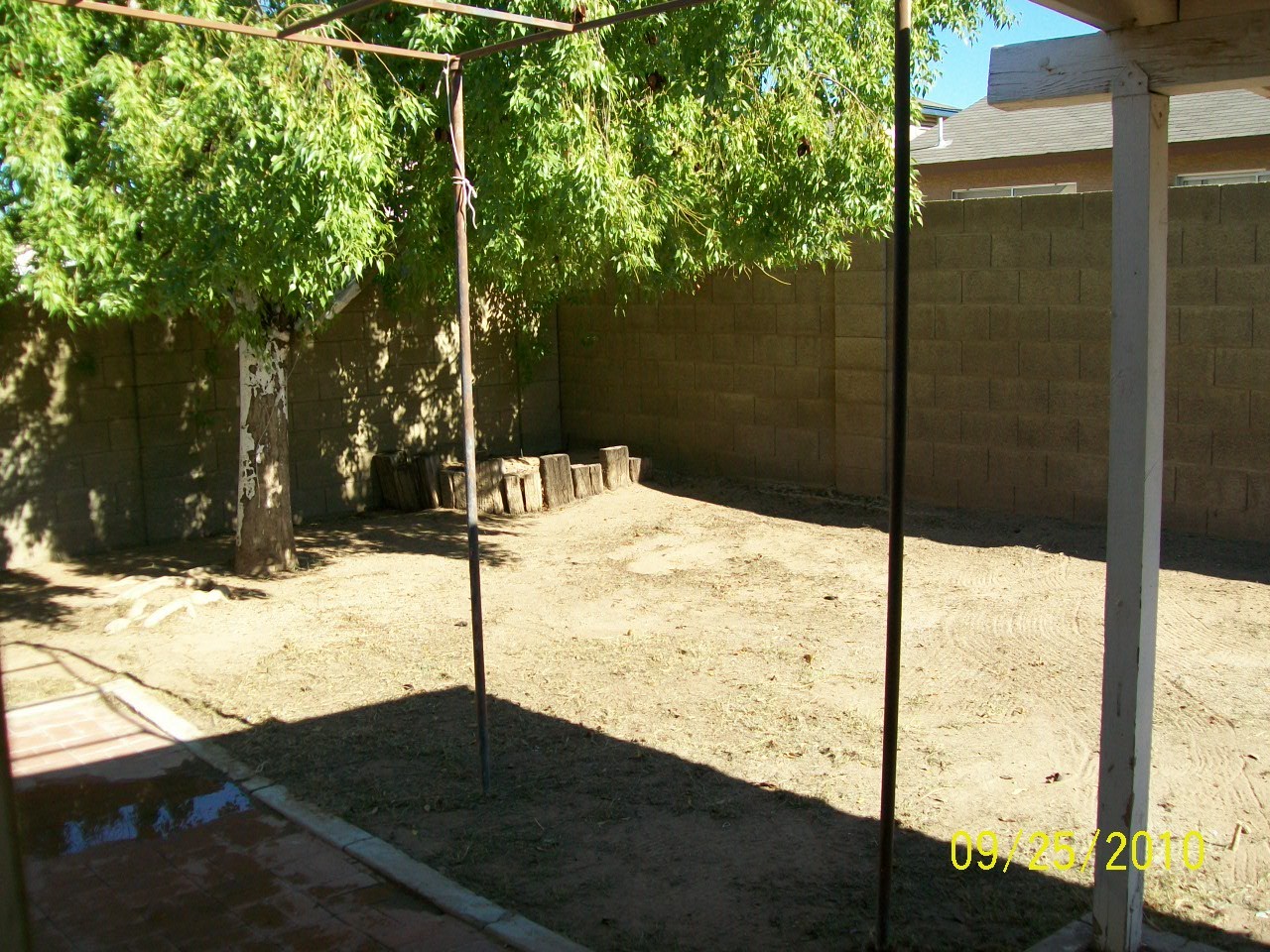 1749 East Carson Road Phoenix, AZ 85042 - Photo 5 of 5 Covered patio in backyard