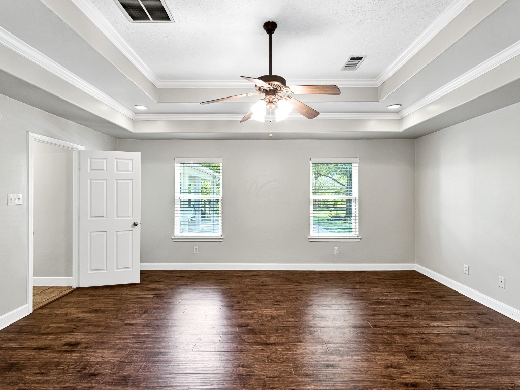 32601 Rogers Road Fulshear, TX 77441 - Photo 26 of 50 This primary bedroom features double tray ceiling and a direct incredible view of the gorgeous pool.