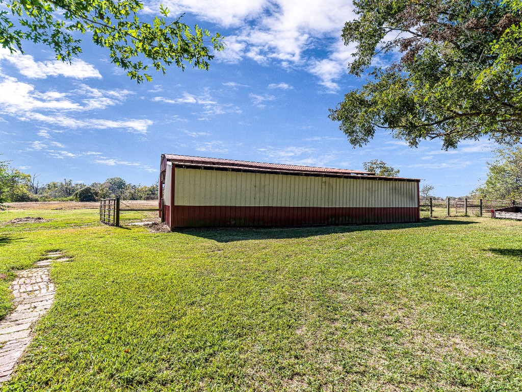 32601 Rogers Road Fulshear, TX 77441 - Photo 46 of 50 This barn is set up with 5 horse stalls and a tack room.