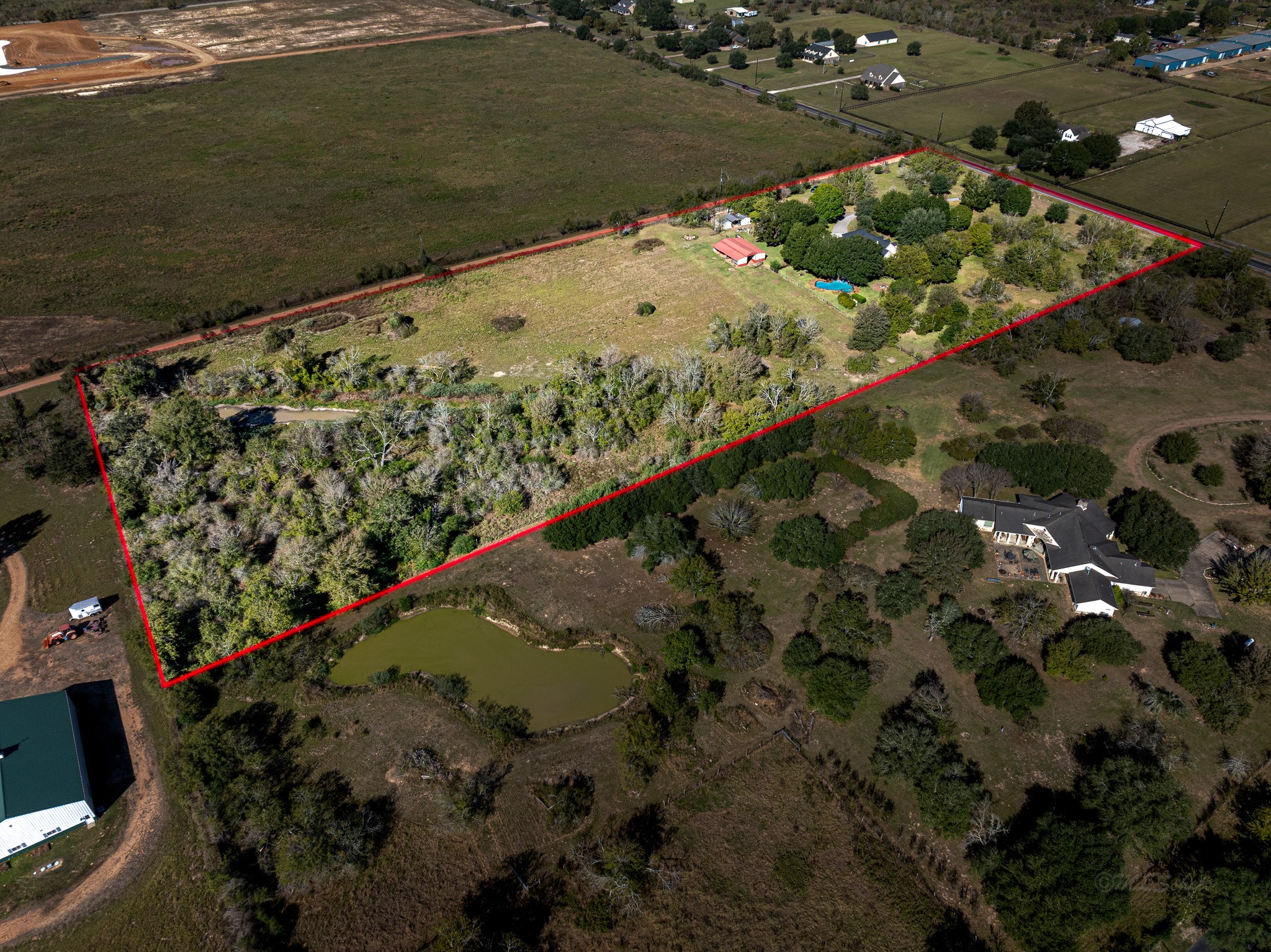 32601 Rogers Road Fulshear, TX 77441 - Photo 47 of 50 Aerial View of this 10 acre property. The back 9 acres are Ag Exempt.