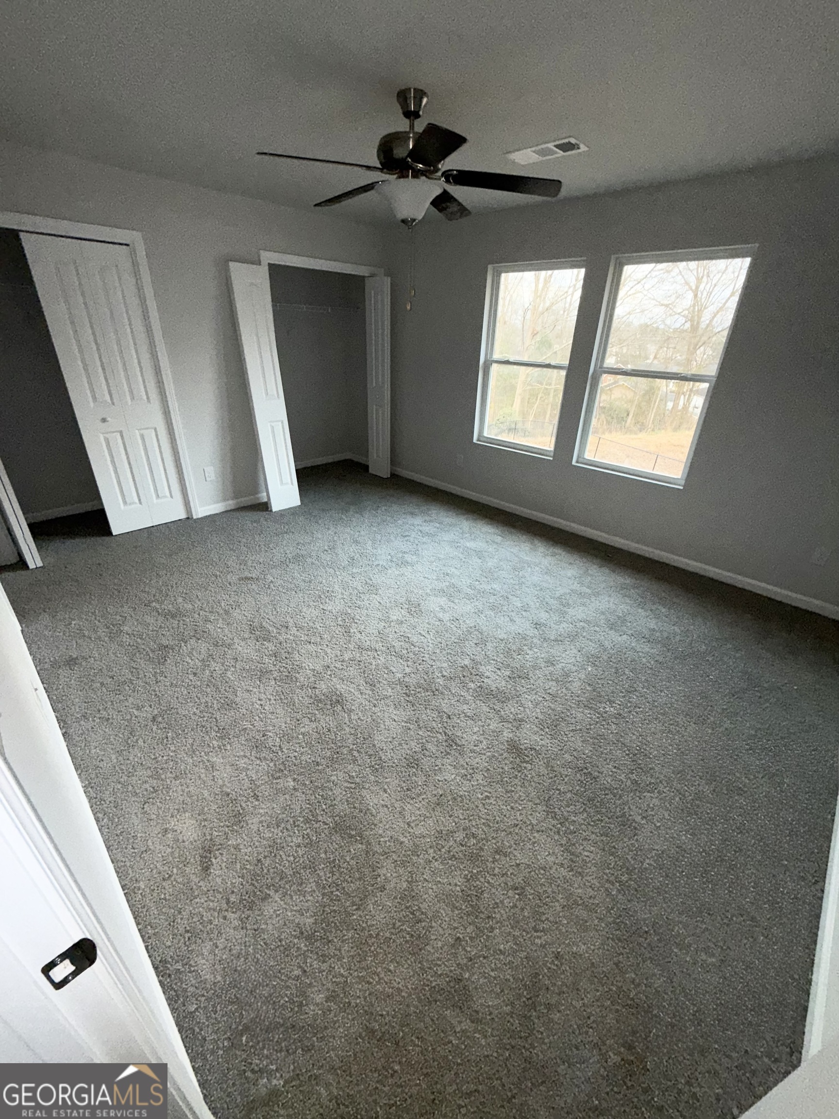 11616 East Lovejoy Road Hampton, GA 30228 - Photo 11 of 23 a view of an empty room with a window