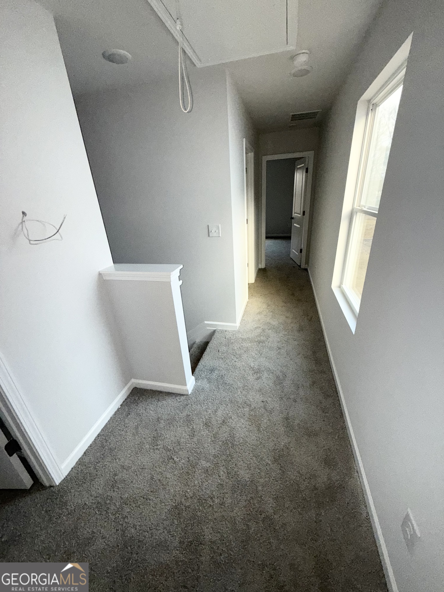 11616 East Lovejoy Road Hampton, GA 30228 - Photo 19 of 23 a view of a big room with closet and windows