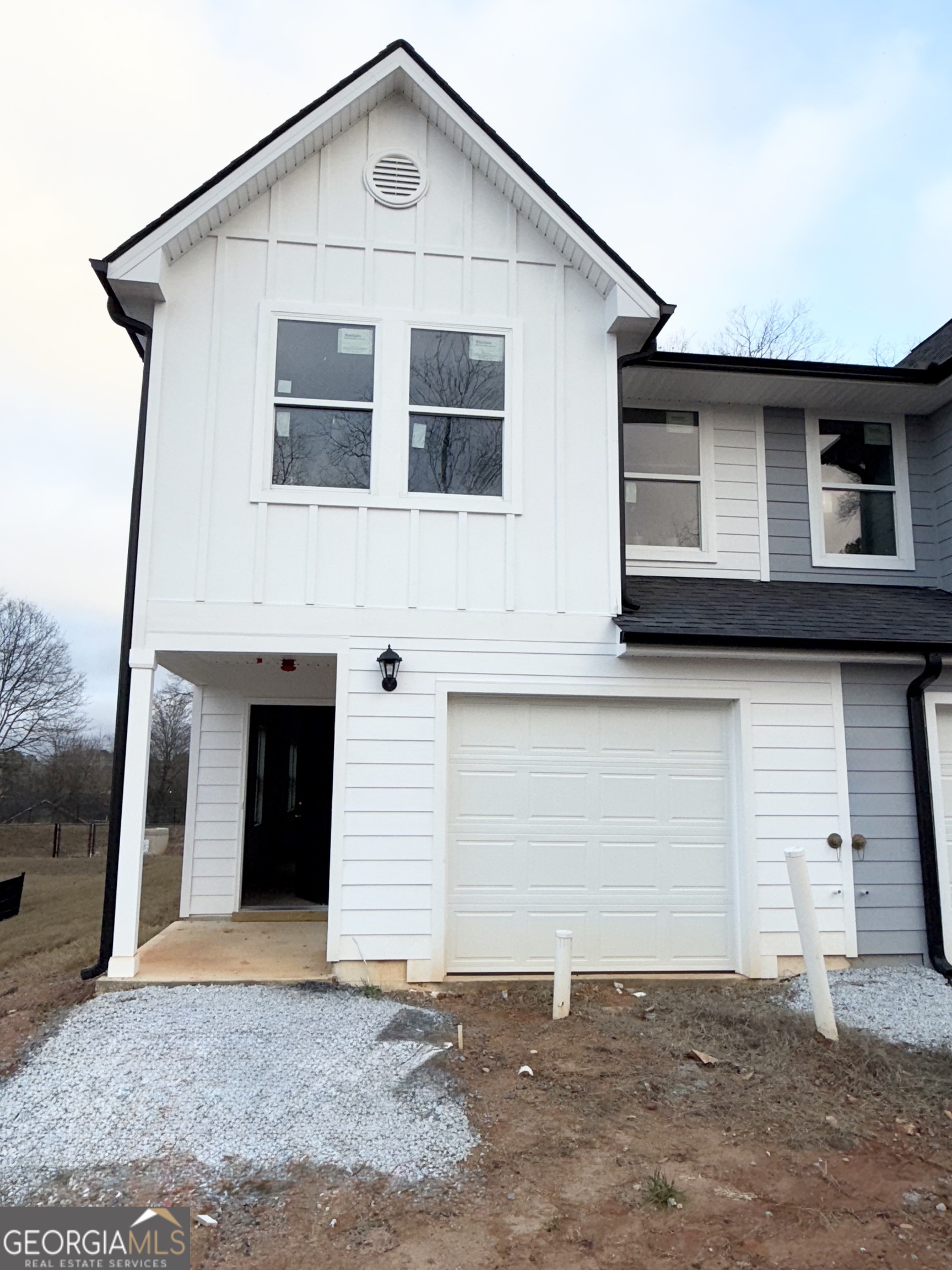 11616 East Lovejoy Road Hampton, GA 30228 - Photo 22 of 23 a front view of a house with a garage