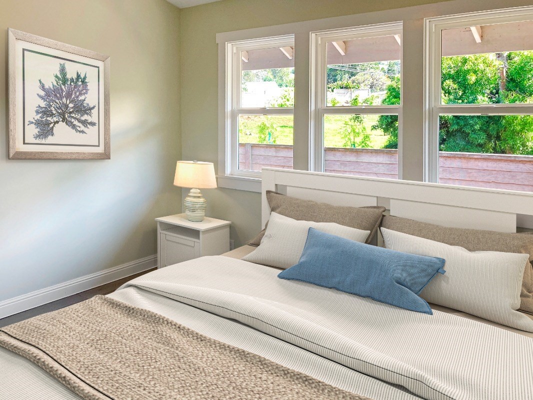 66-1515 Kawaihae Road Kamuela, HI 96743 - Photo 12 of 20 a bedroom with a bed and a window