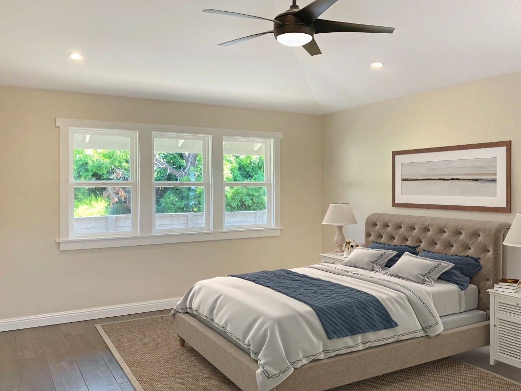 66-1515 Kawaihae Road Kamuela, HI 96743 - Photo 13 of 20 a bedroom with a bed and window