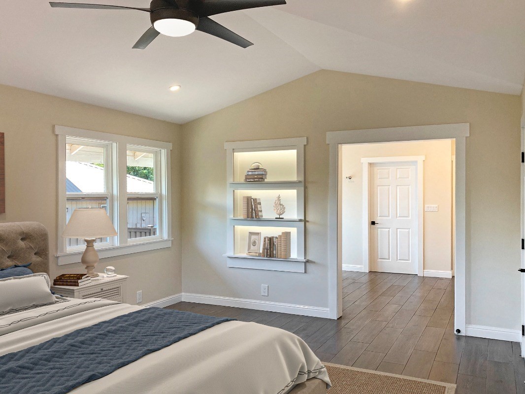 66-1515 Kawaihae Road Kamuela, HI 96743 - Photo 14 of 20 a bedroom with furniture and a window