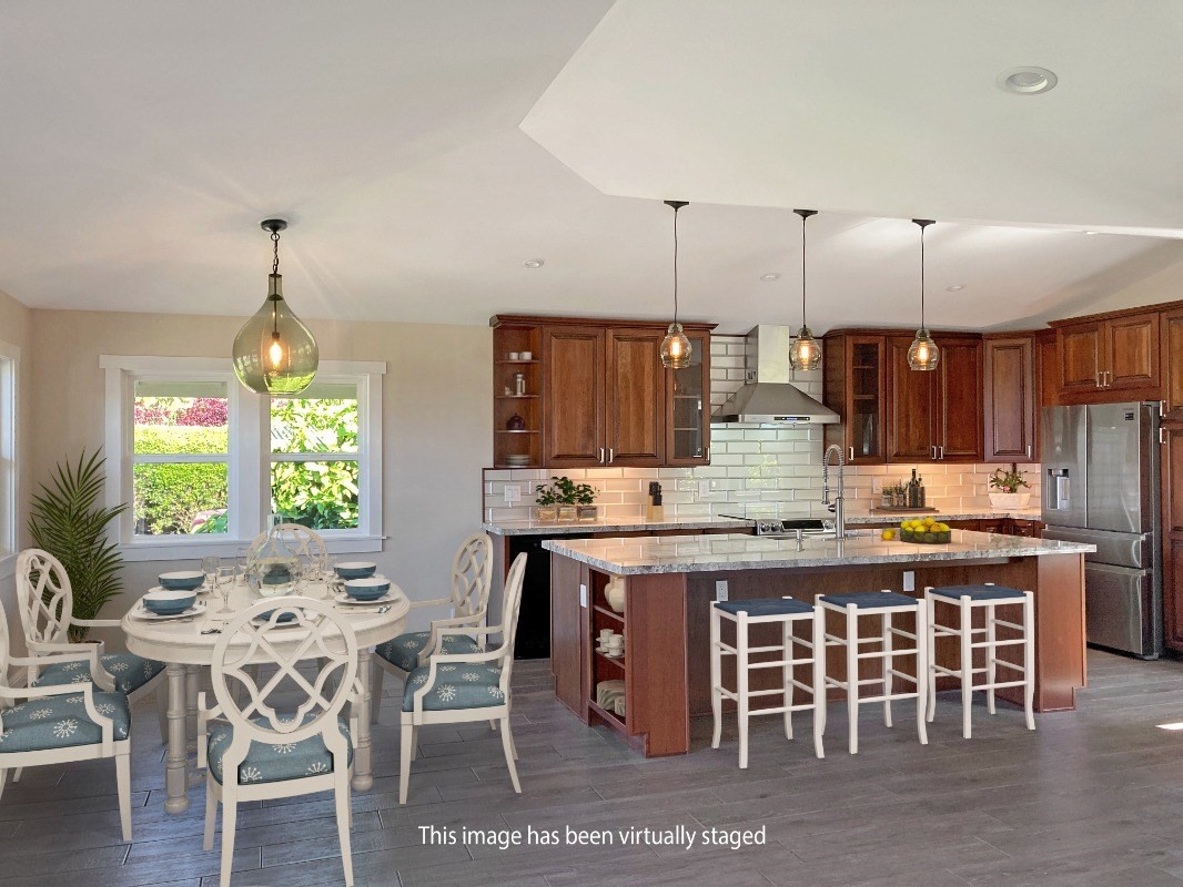 66-1515 Kawaihae Road Kamuela, HI 96743 - Photo 4 of 20 a kitchen with a table and chairs in it