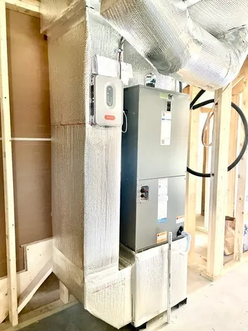 a view of a door and a window