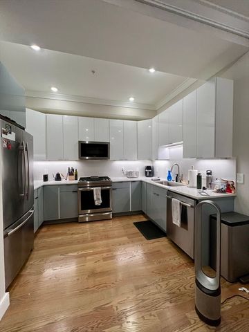 a view of a storage & utility room with washer and dryer