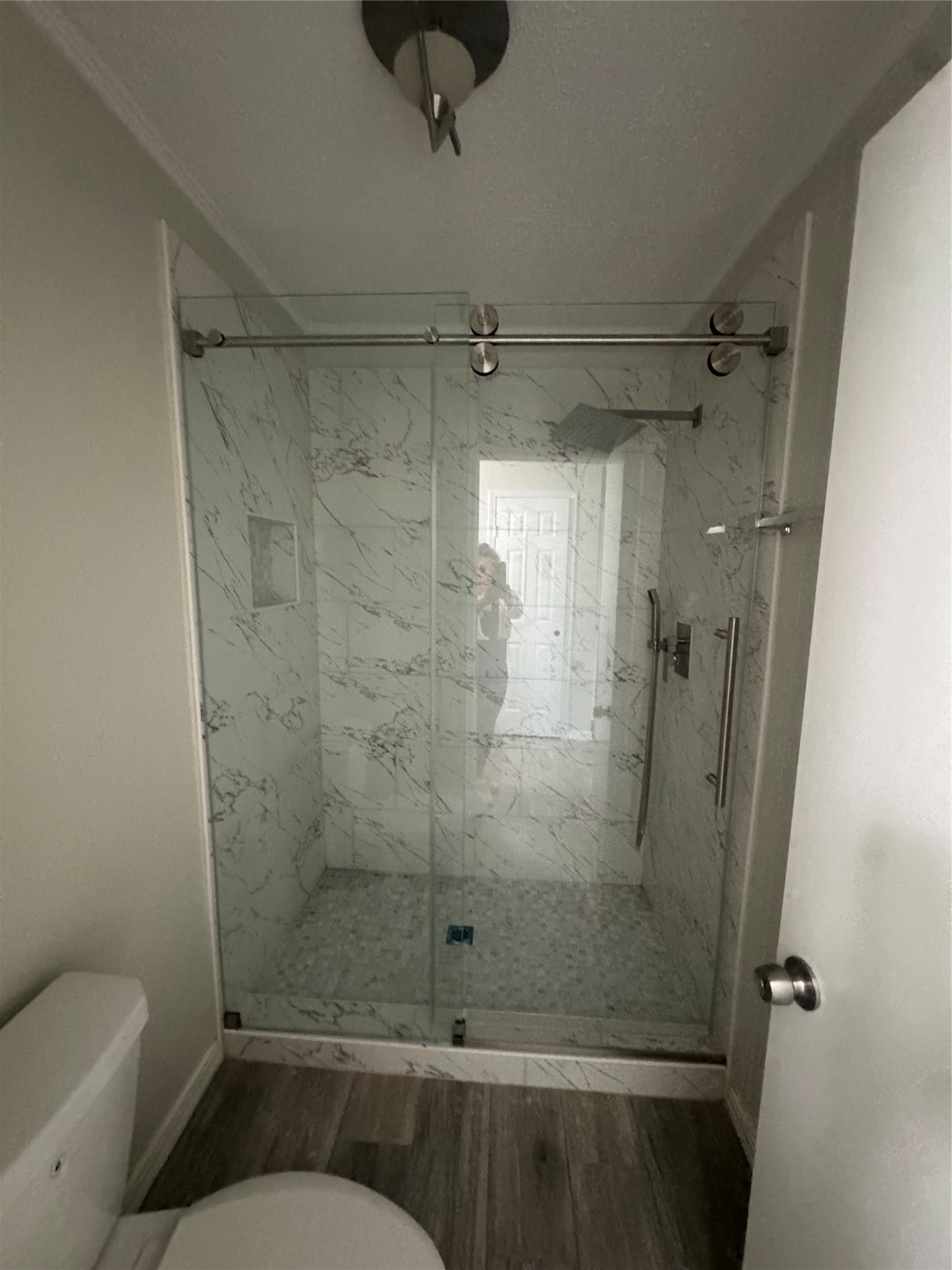 13626 Sunswept Way Houston, TX 77082 - Photo 13 of 30 a bathroom with a shower and toilet